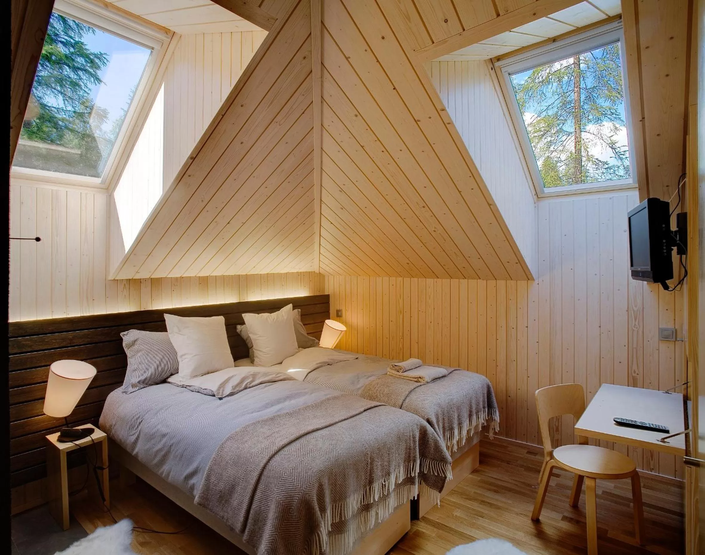 Bed in Saimaanranta Resort by Anttolanhovi