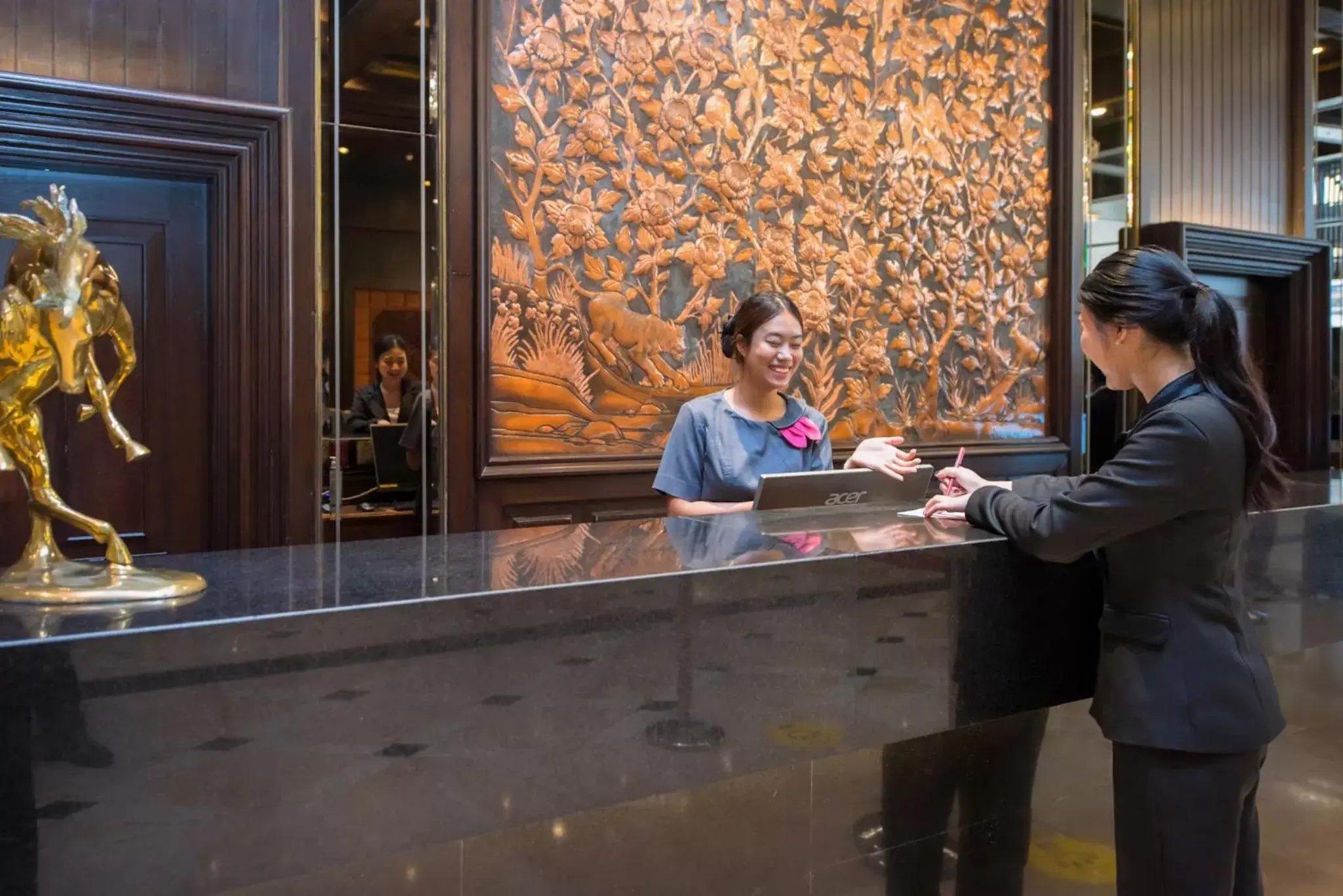 Staff in Ambassador Hotel Bangkok - SHA Extra Plus