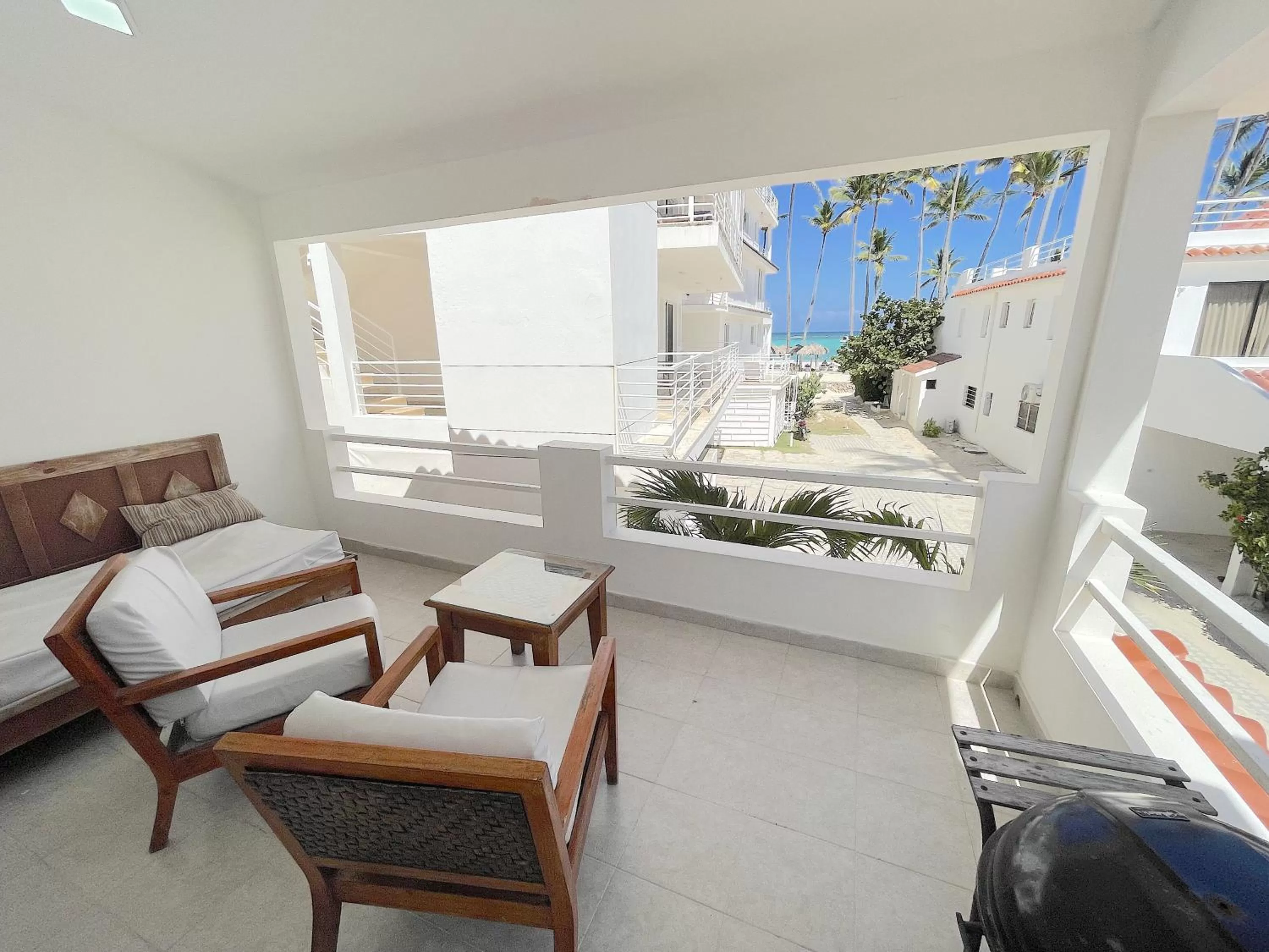 Patio, Seating Area in BEACH Condo-HOTEL with VILLAS & PRIVATE Apartments WIFI BBQ Beach CLUB & SPA