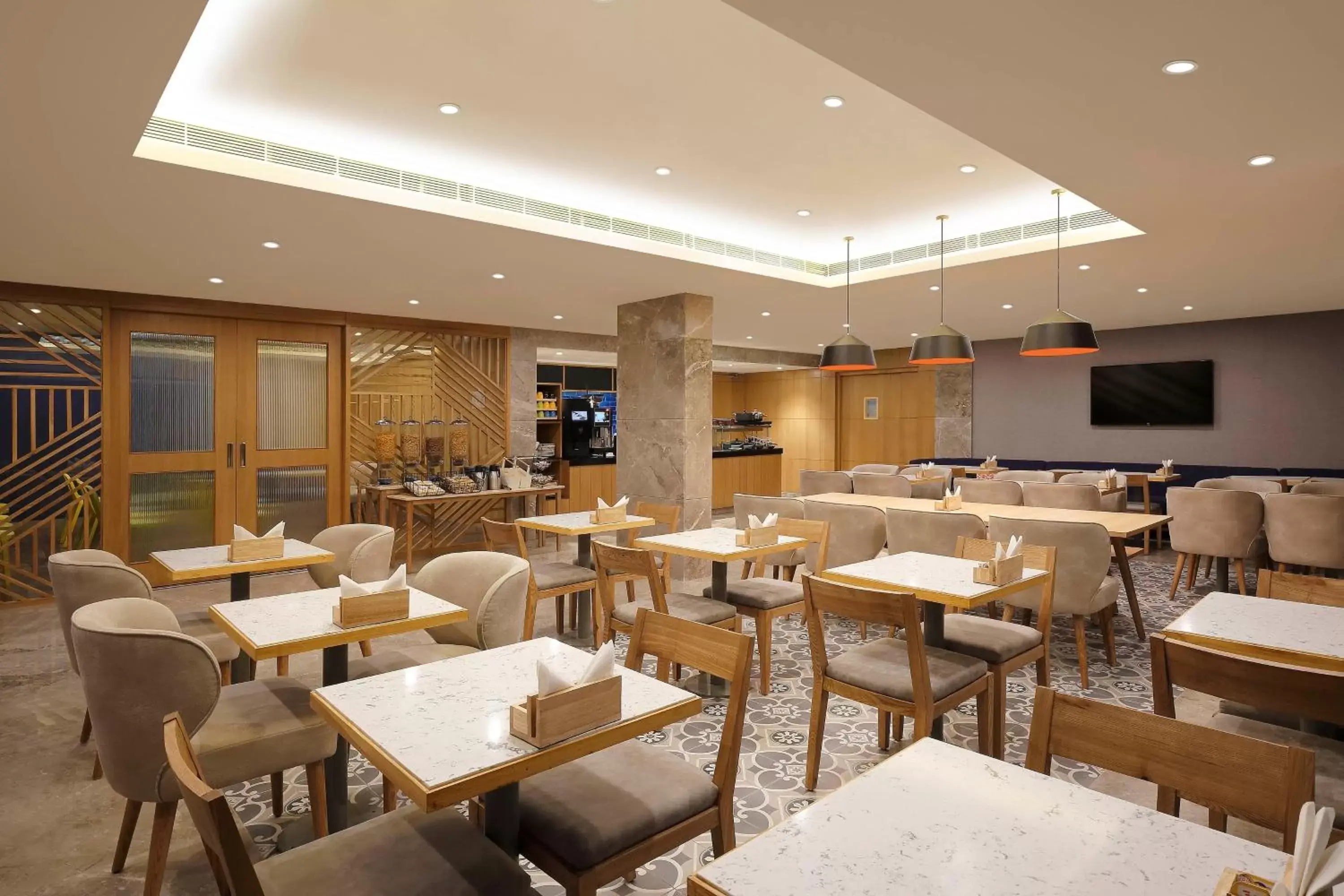 Restaurant/Places to Eat in Holiday Inn Express Ahmedabad Prahlad Nagar, an IHG Hotel
