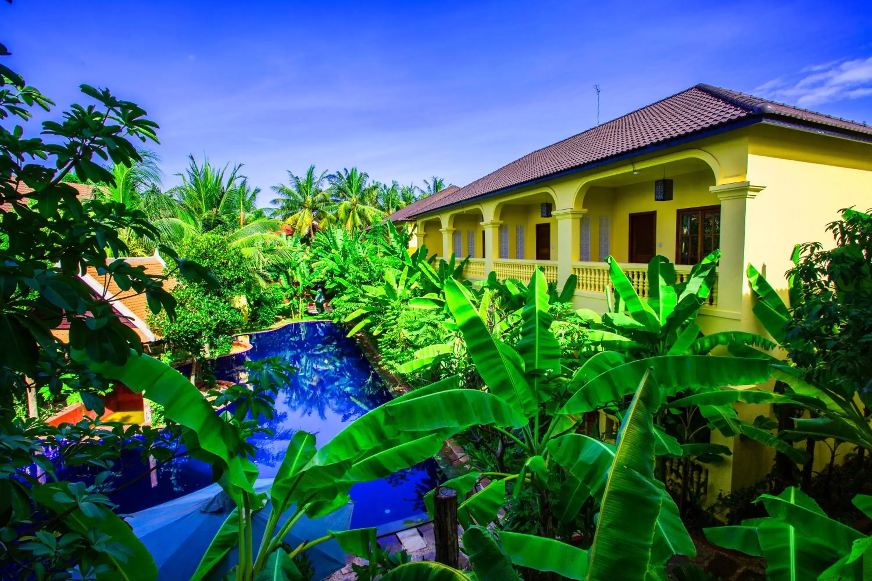 Swimming pool, Property Building in Le Jardin d'Angkor Hotel & Resort