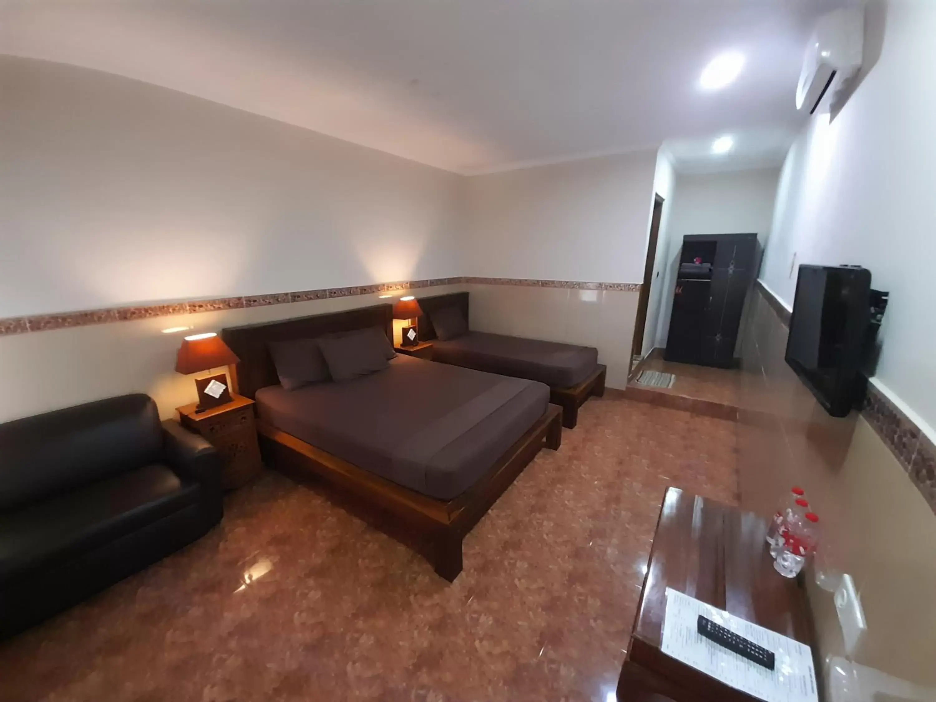 Triple Room in Puri Bali Hotel Triple Room in Puri Bali Hotel