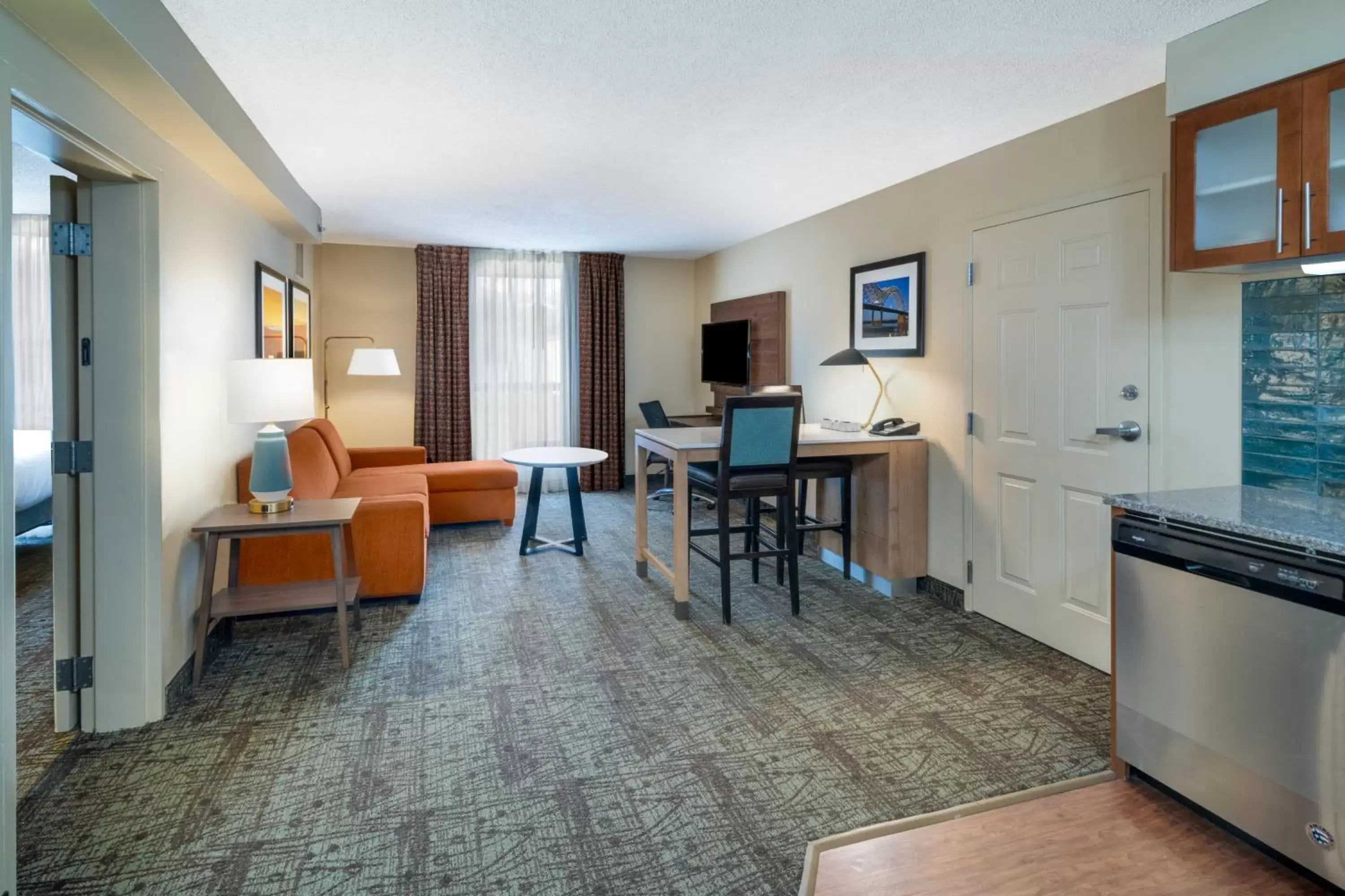 TV and multimedia, Seating Area in Staybridge Suites Memphis-Poplar Ave East, an IHG Hotel