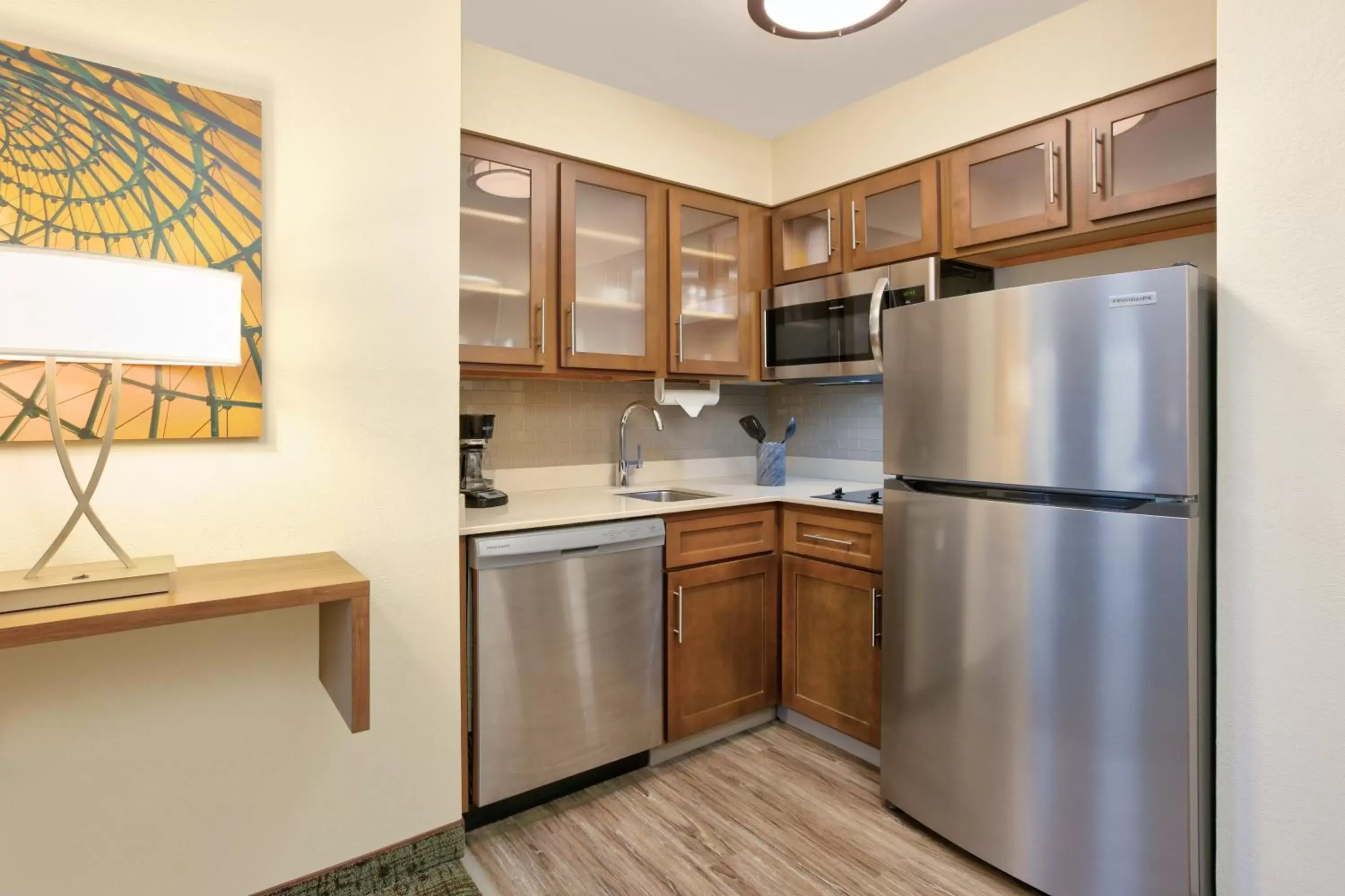 Bedroom, Kitchen/Kitchenette in Staybridge Suites Corning, an IHG Hotel