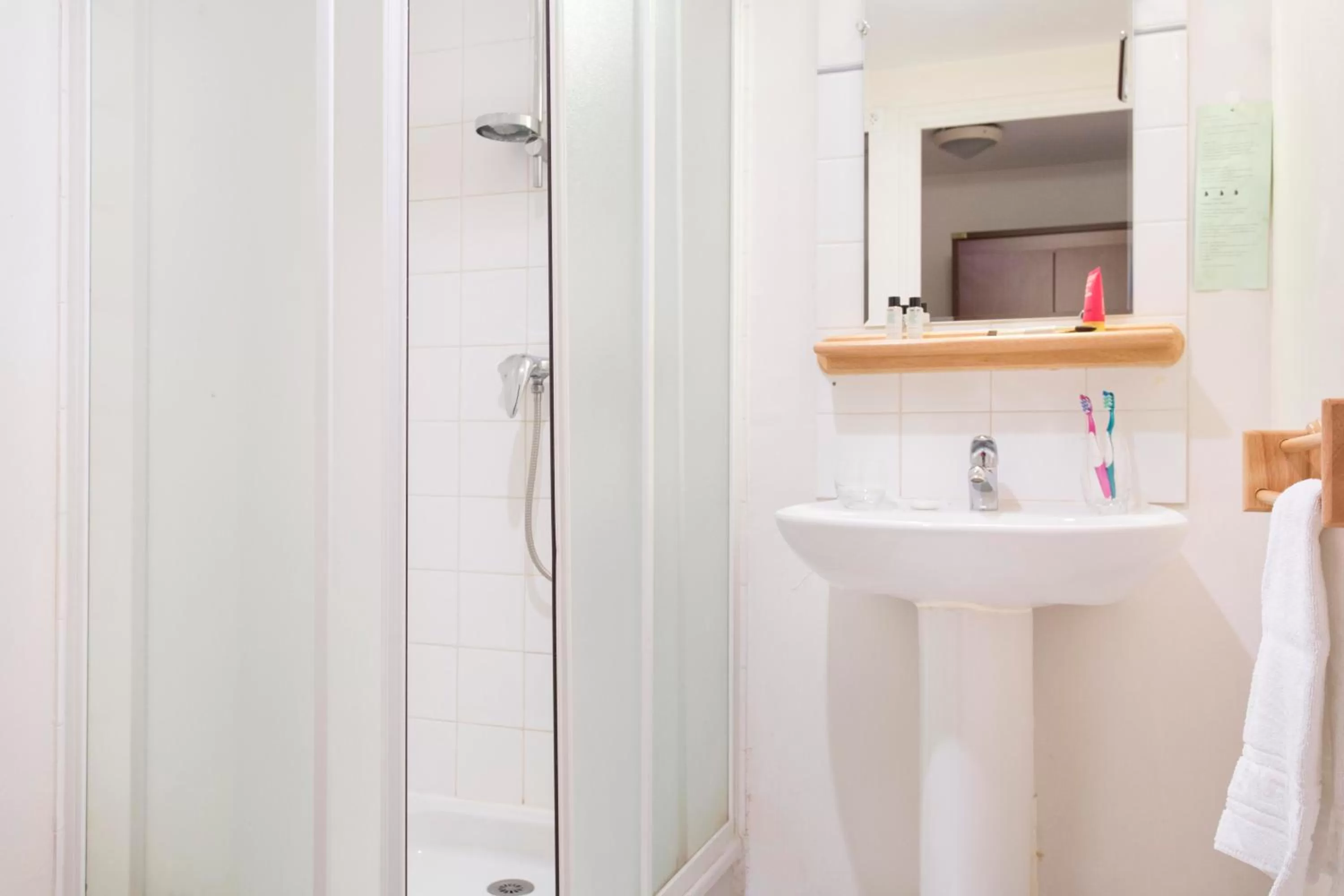 Shower in Hôtel Les Gens De Mer Lorient by Popinns