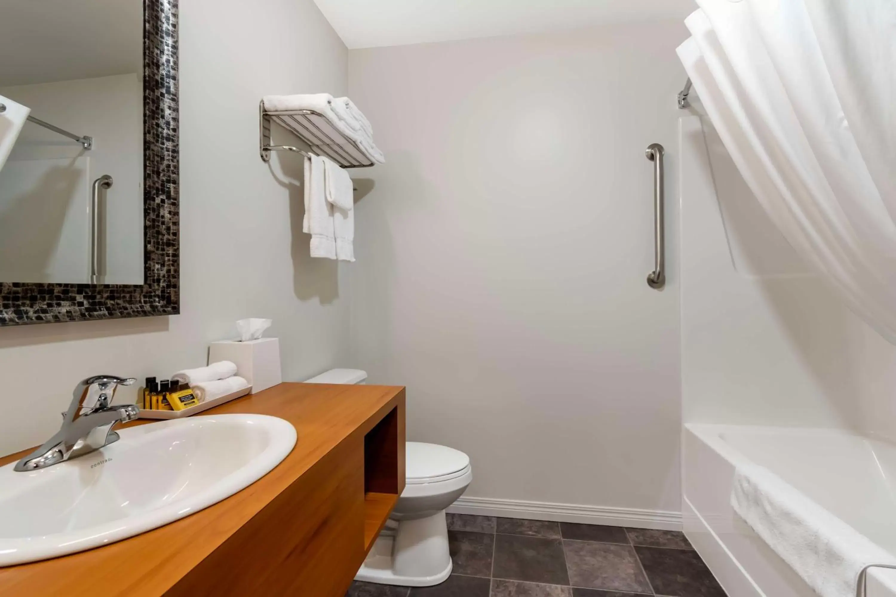 Bathroom in Villa Inn & Suites - SureStay Collection by Best Western