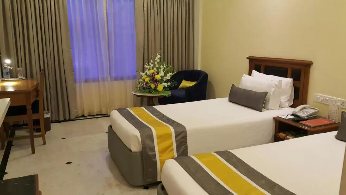 Photo of the whole room, Bed in Regency Kanchipuram by GRT Hotels