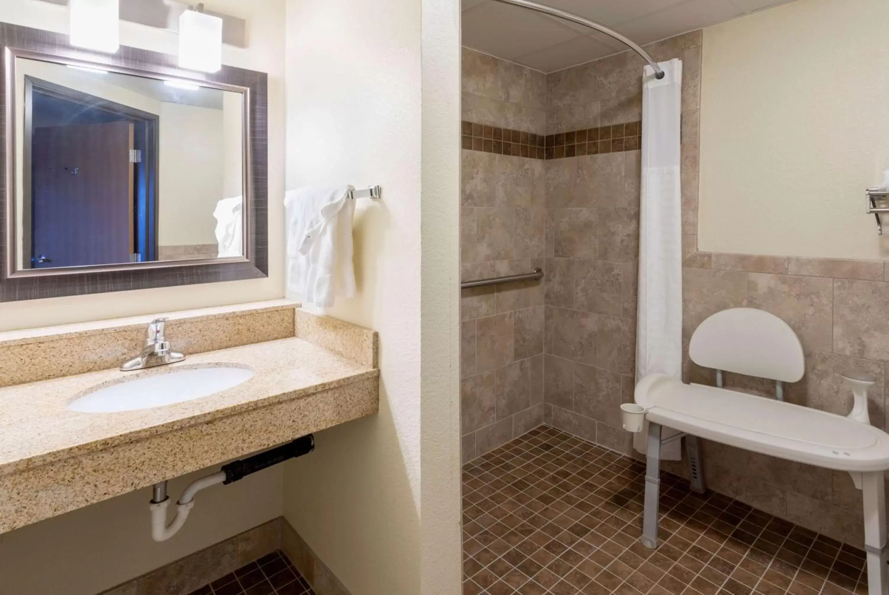 Bathroom in AmericInn by Wyndham Fergus Falls Conference Center