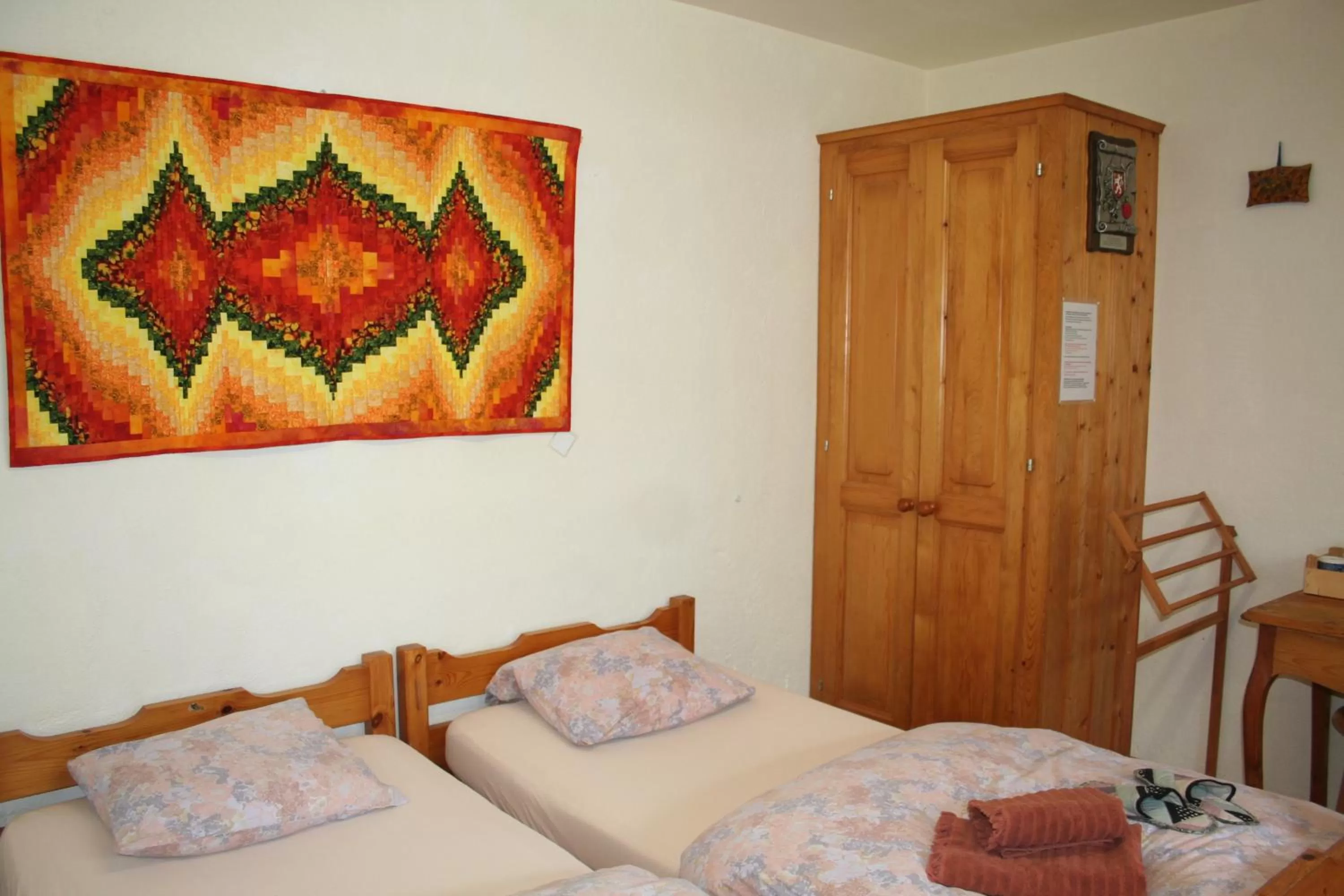 Bed in BnB Claudy et Elizabeth Michellod-Dutheil