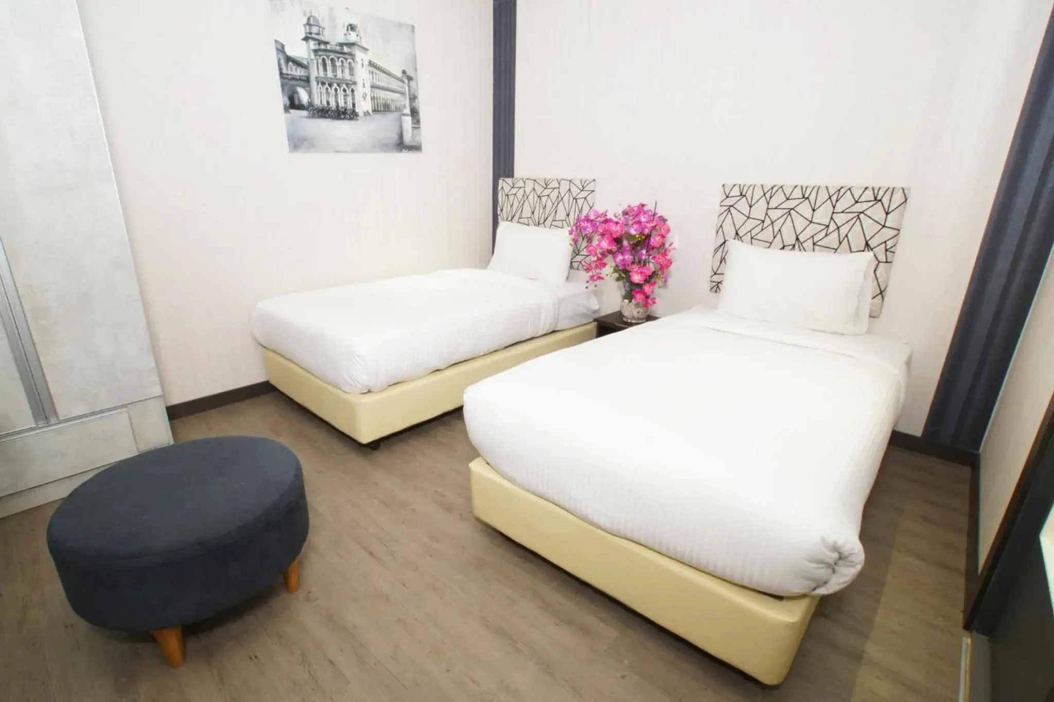 Bed in Vivids Hotel