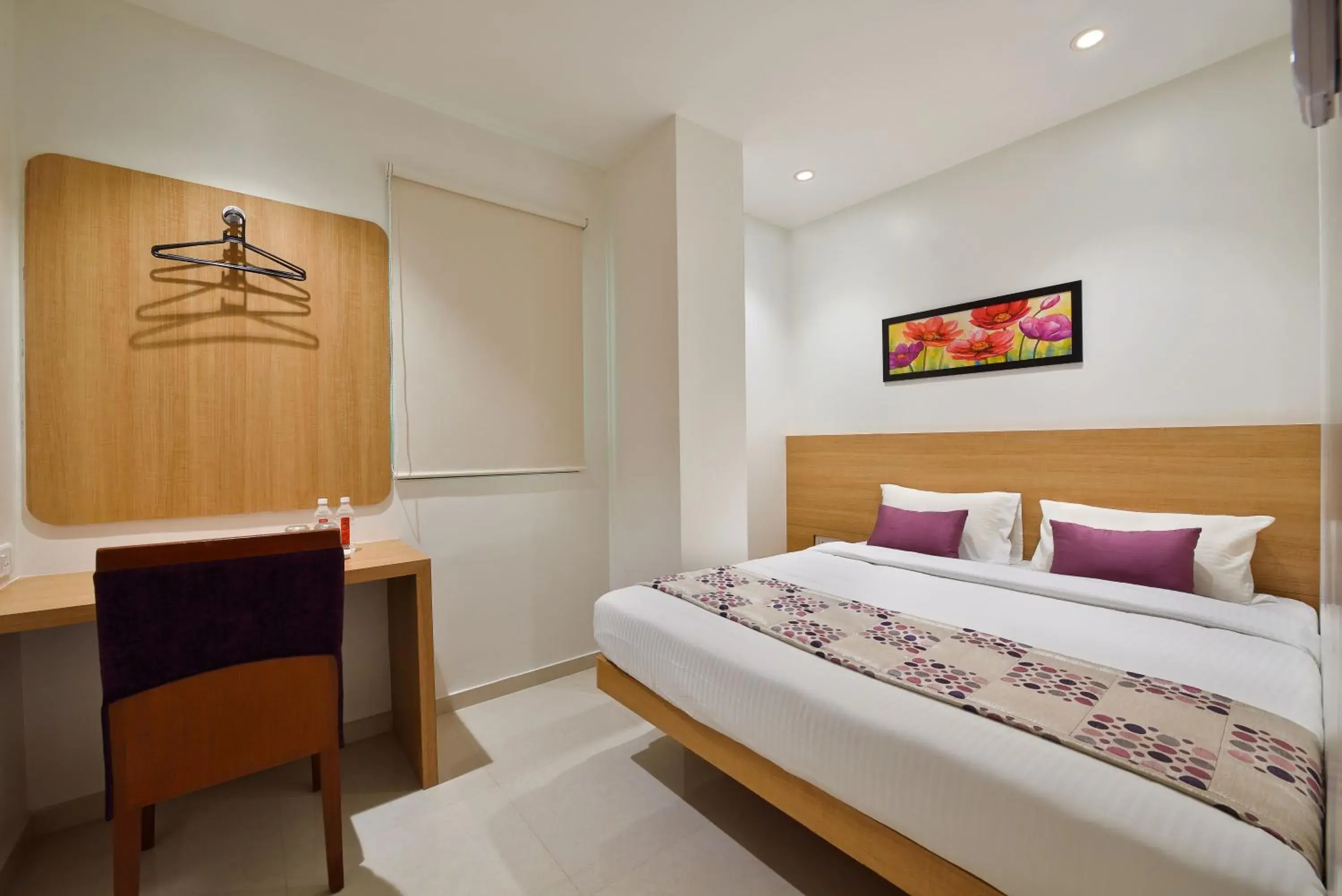 Bed in Hotel Leafio Mumbai