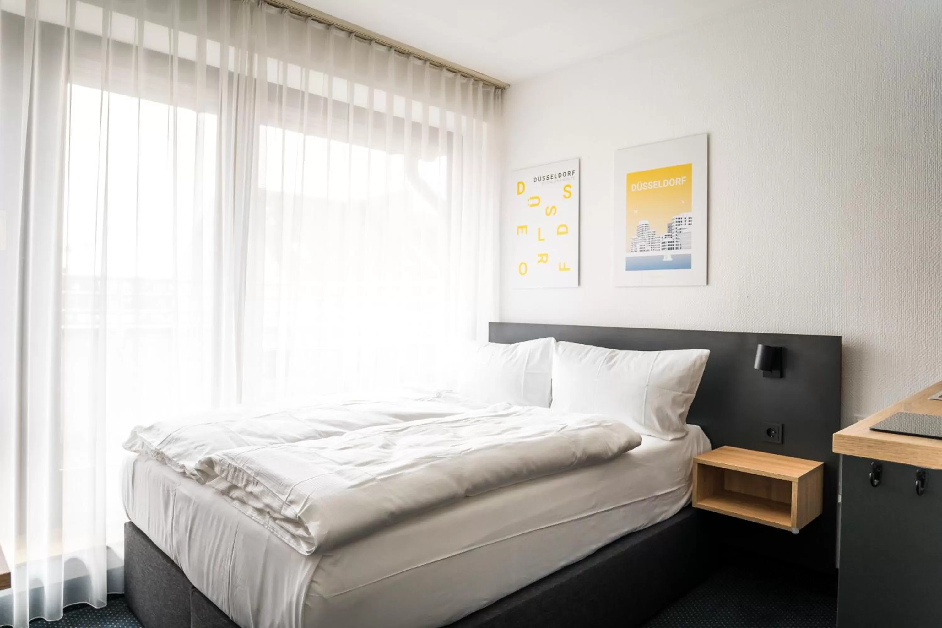 Bed in Apartments an der Kö