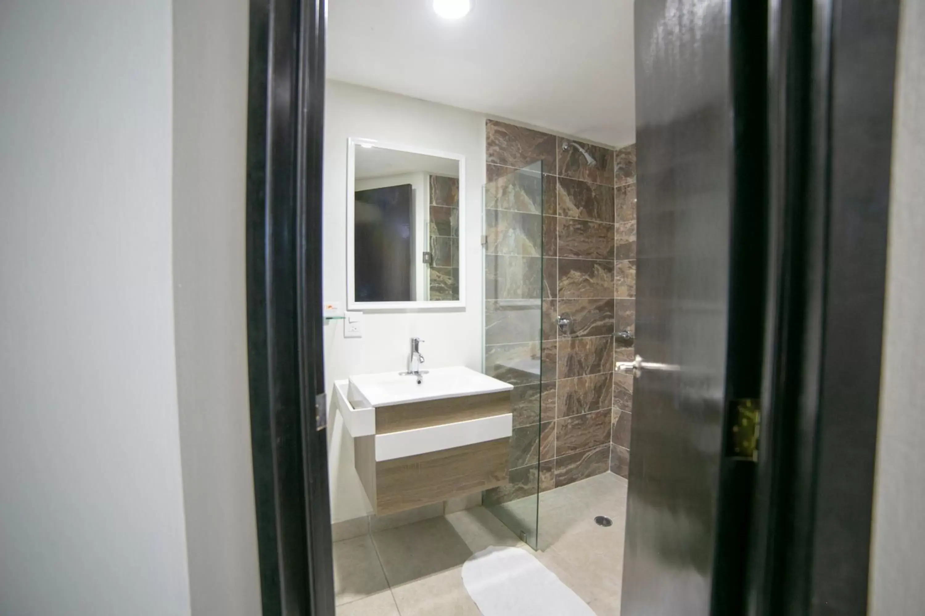 Shower, Bathroom in Hotel RS Suites