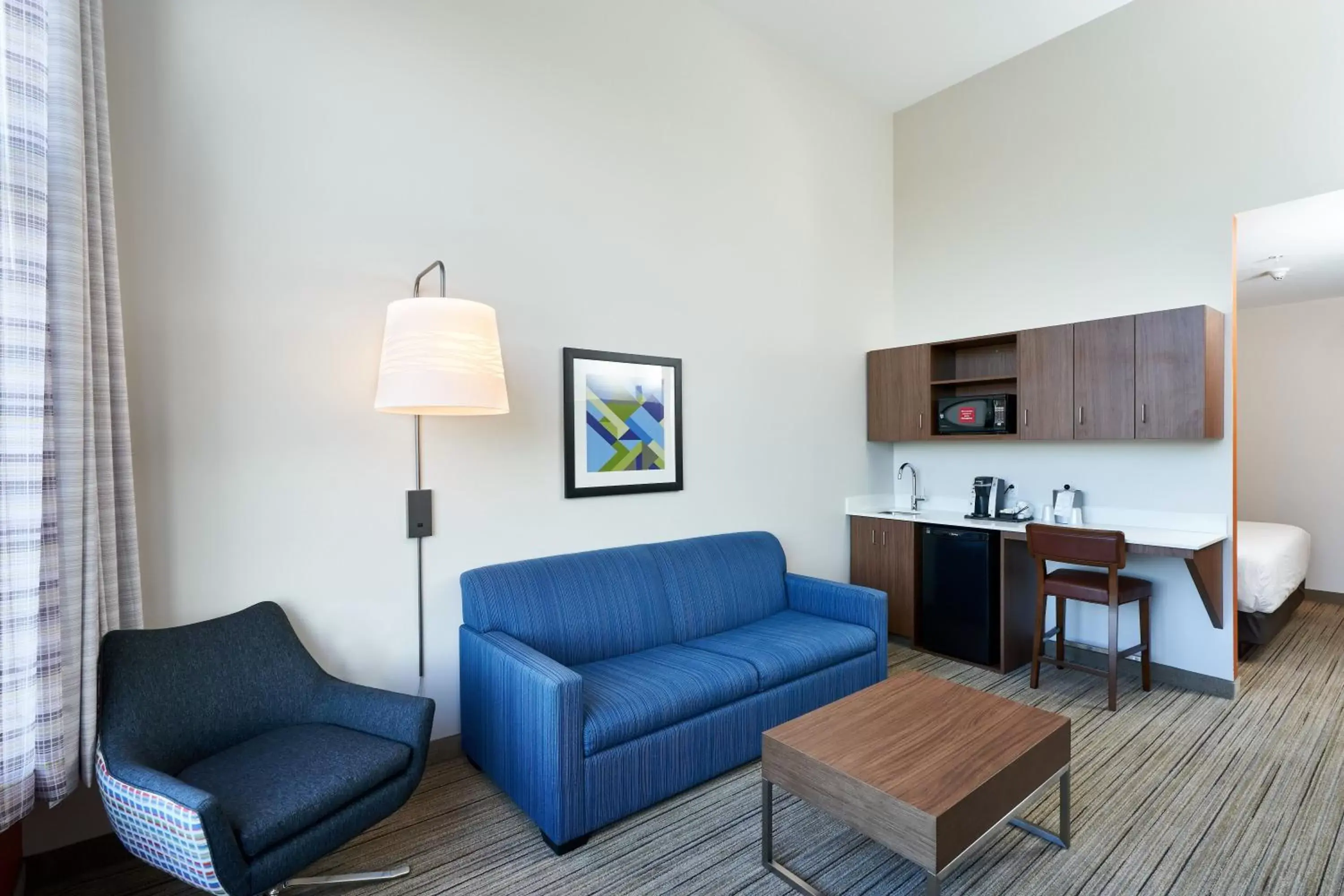 Bedroom, Seating Area in Holiday Inn Express Hotel & Suites Dieppe Airport, an IHG Hotel