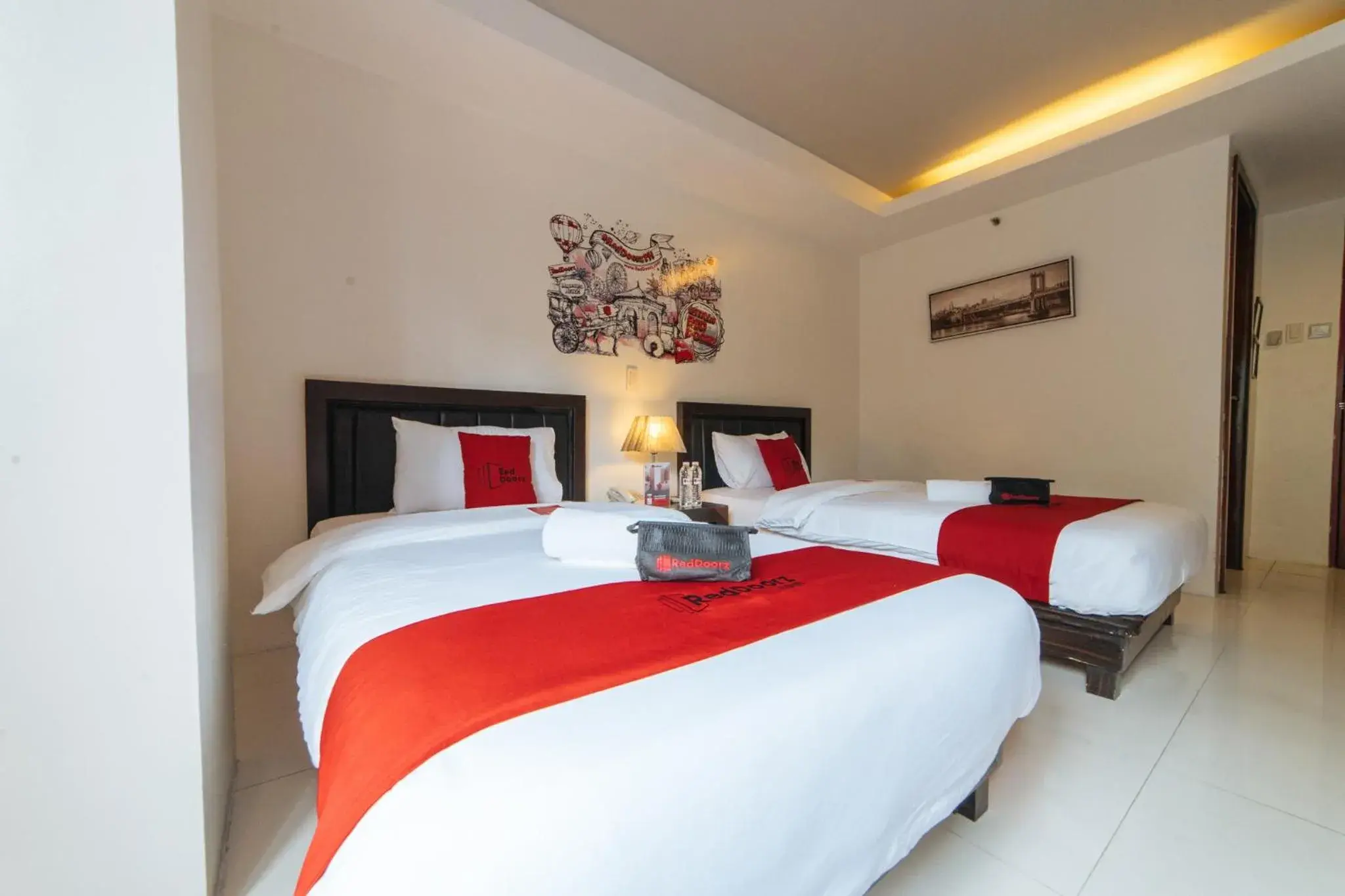 Bed in RedDoorz Plus at One Liberty Hotel Kalayaan Avenue