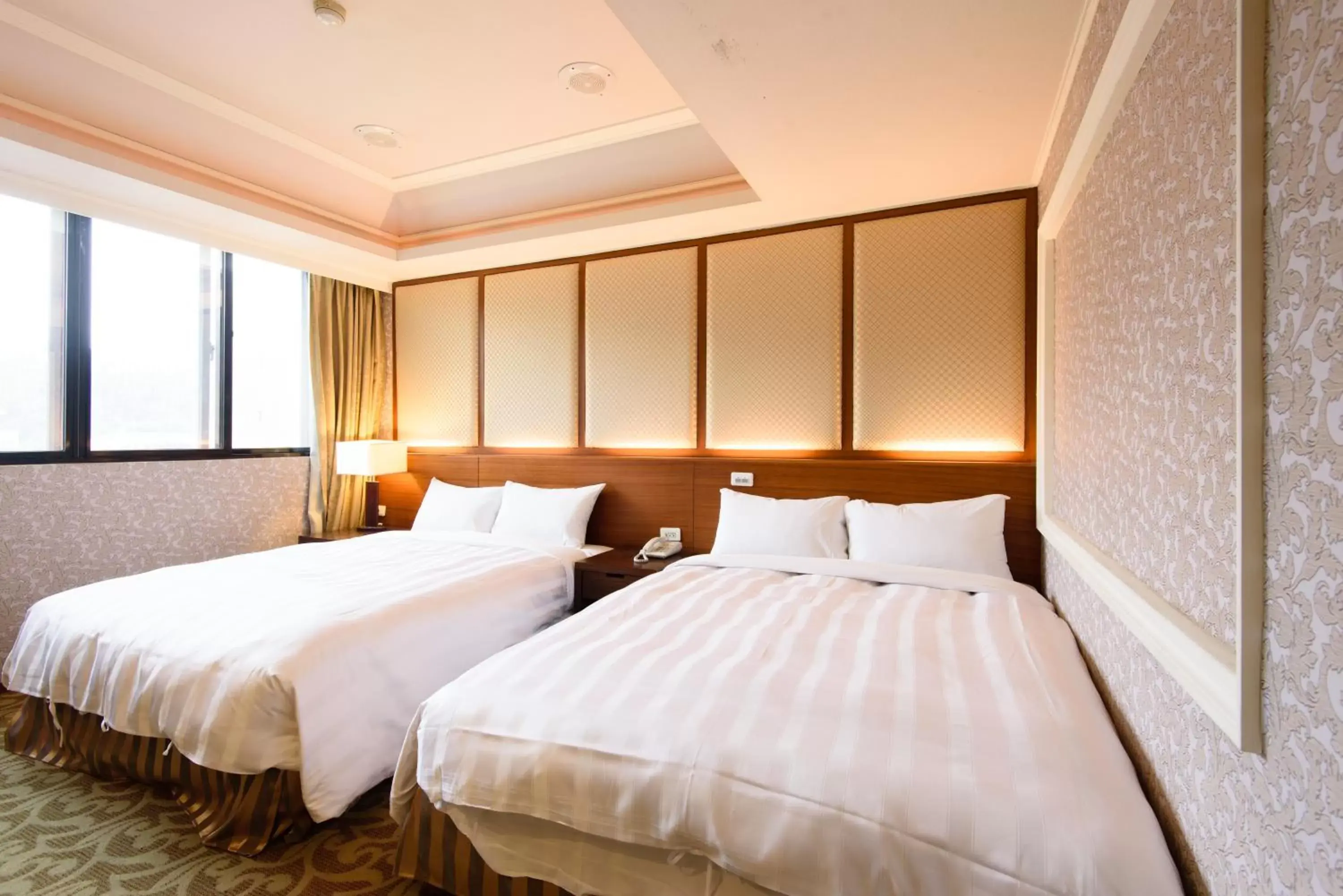 Bed in Herhuan Hotel