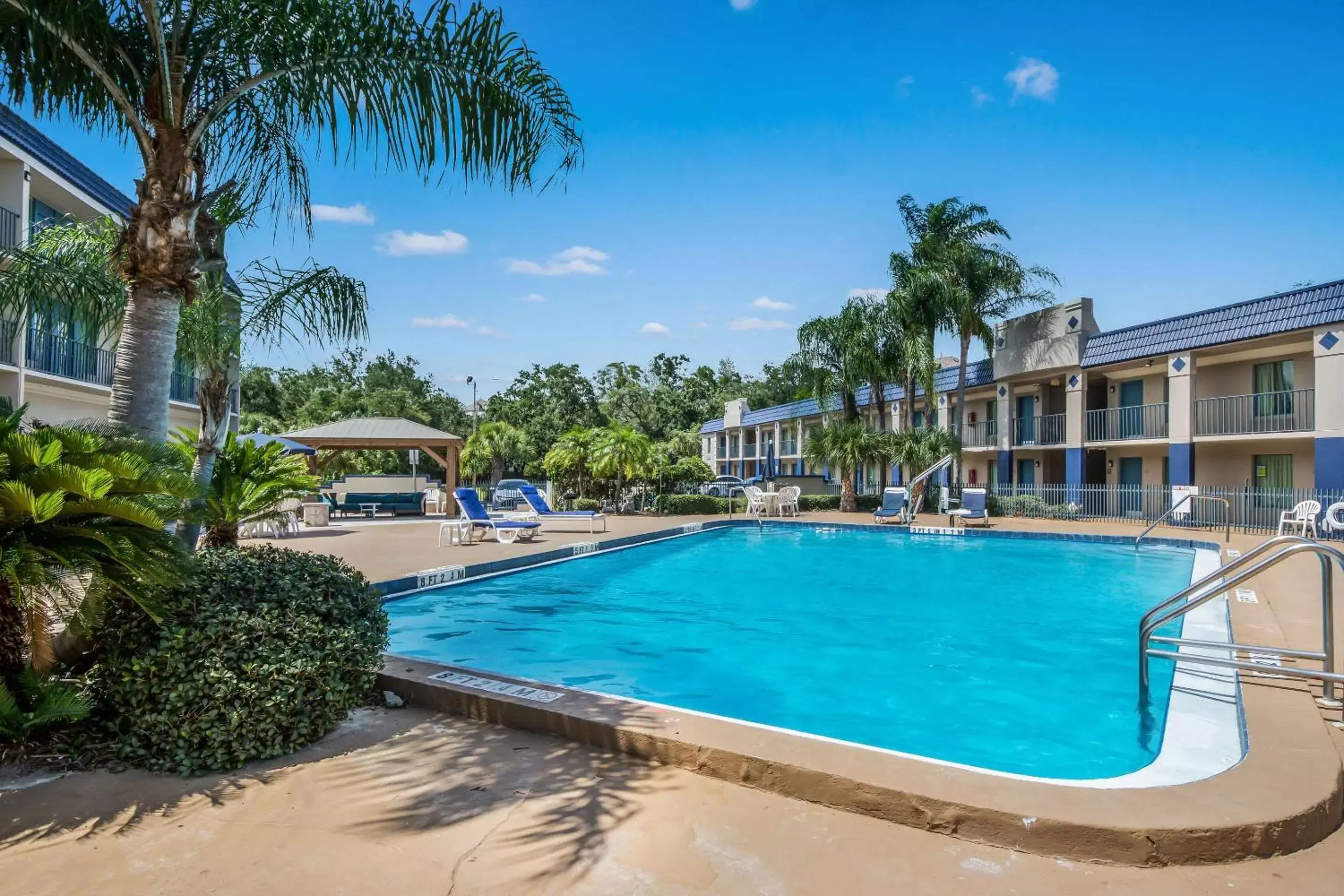 On site, Swimming Pool in Clarion Inn & Suites Central Clearwater Beach