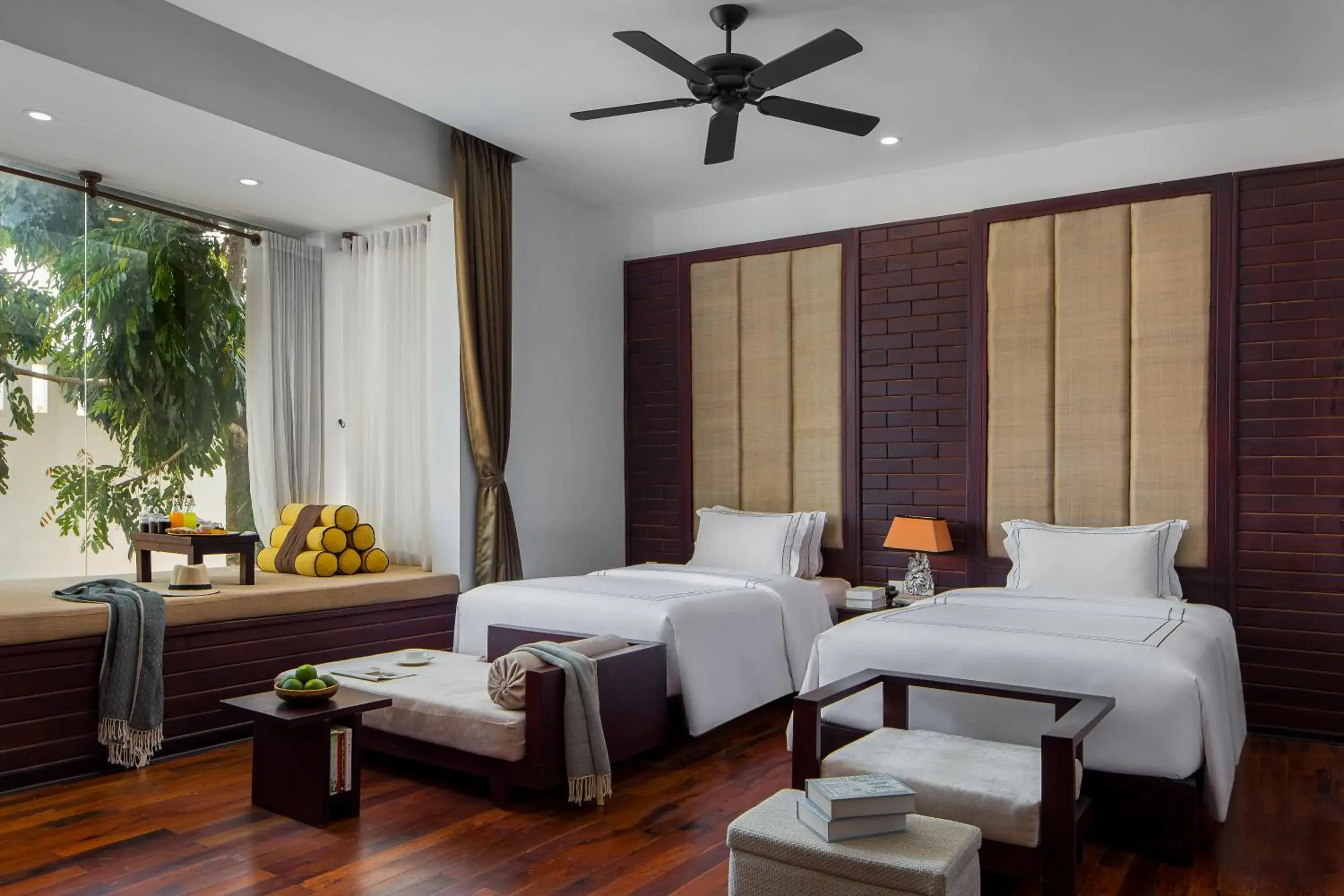 Bed in The Embassy Angkor Resort & Spa