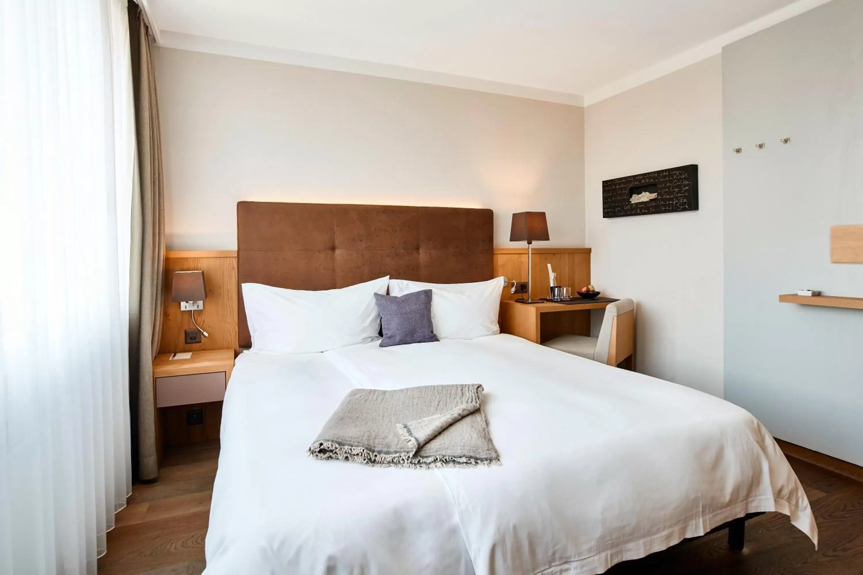 Bed in Victoria - Alpine Boutique Hotel & Fine Dining