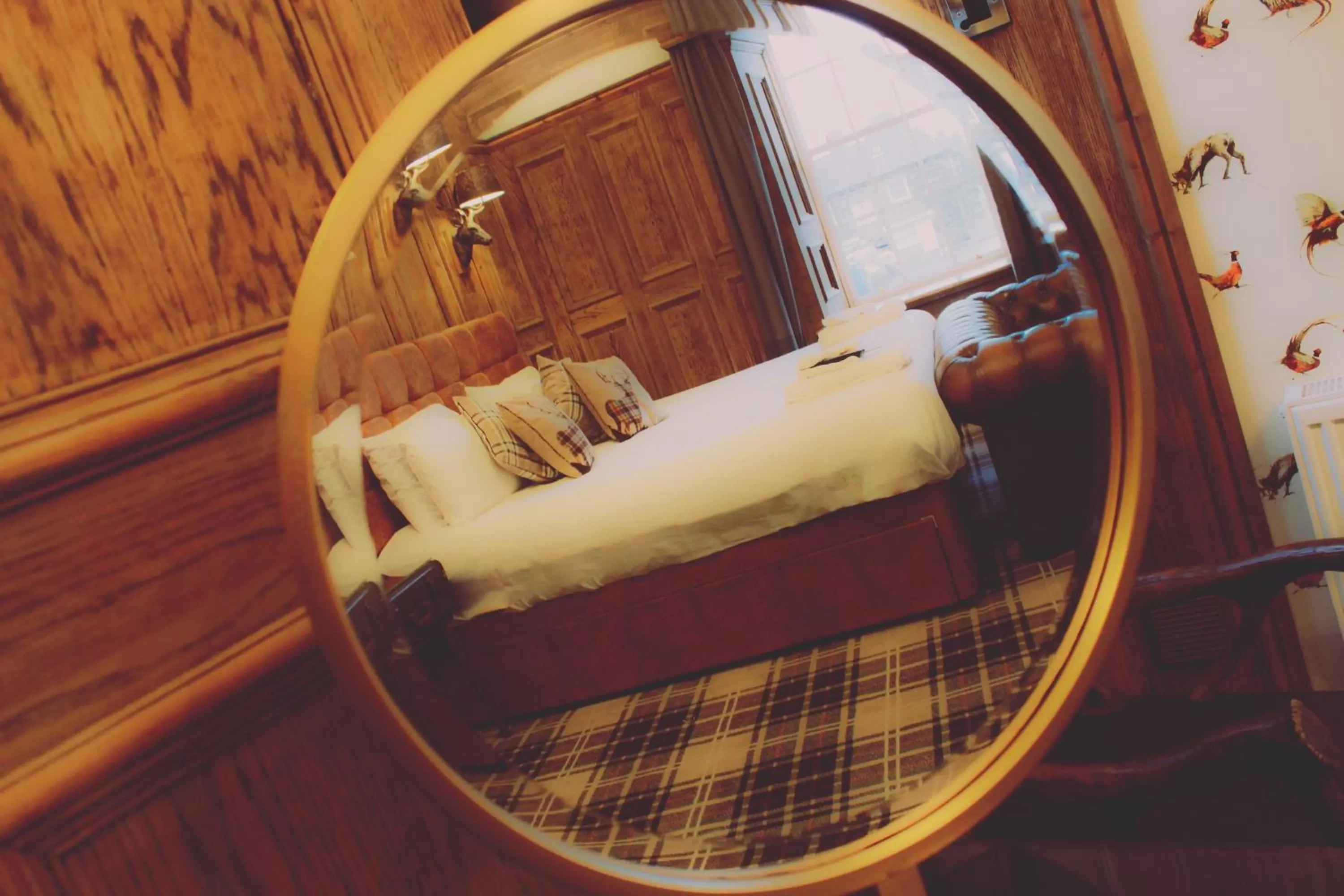 Bed in The Golden Fleece Inn