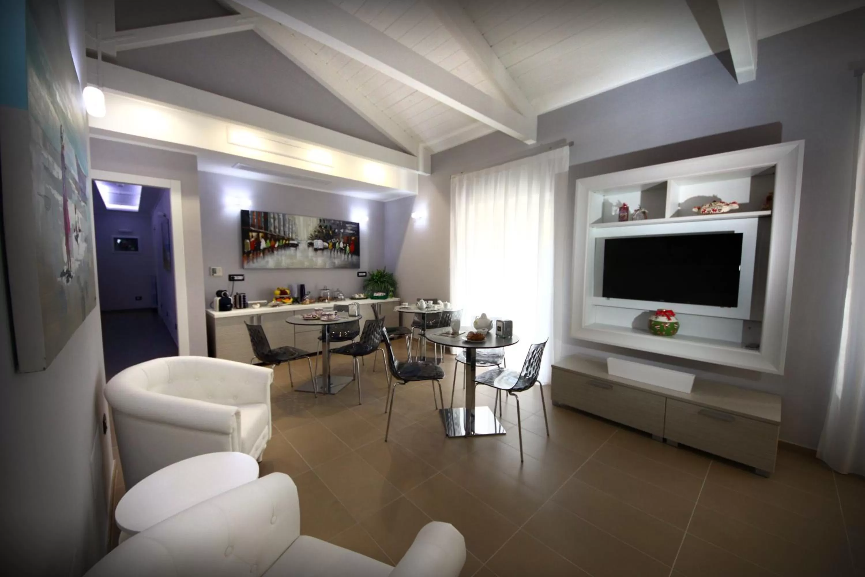 Communal lounge/ TV room in La Corte del Geco
