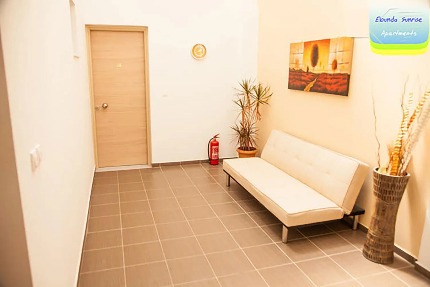 Seating area, Bed in Elounda Sunrise Apartments