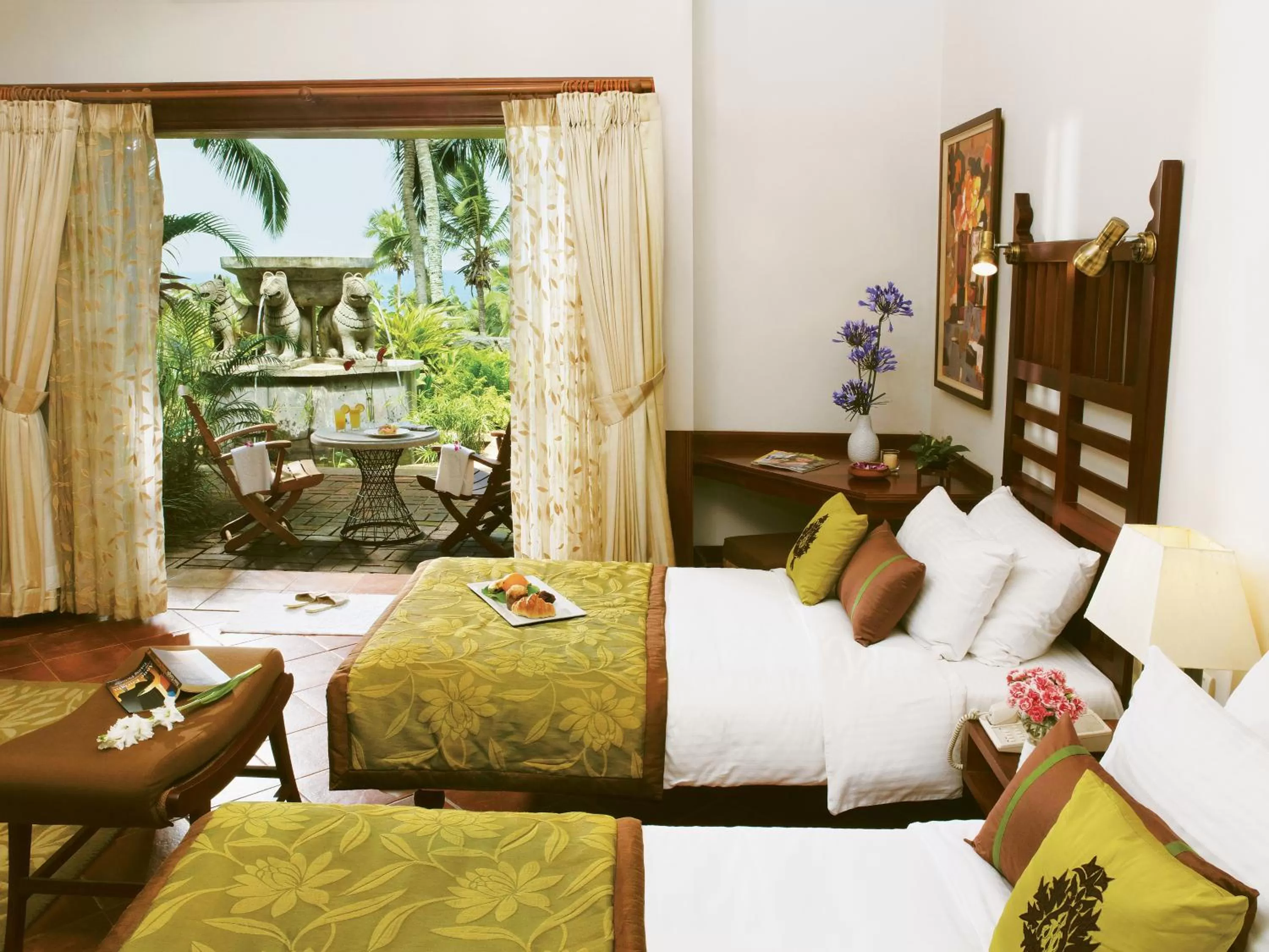 Photo of the whole room, Bed in Taj Green Cove Resort and Spa Kovalam