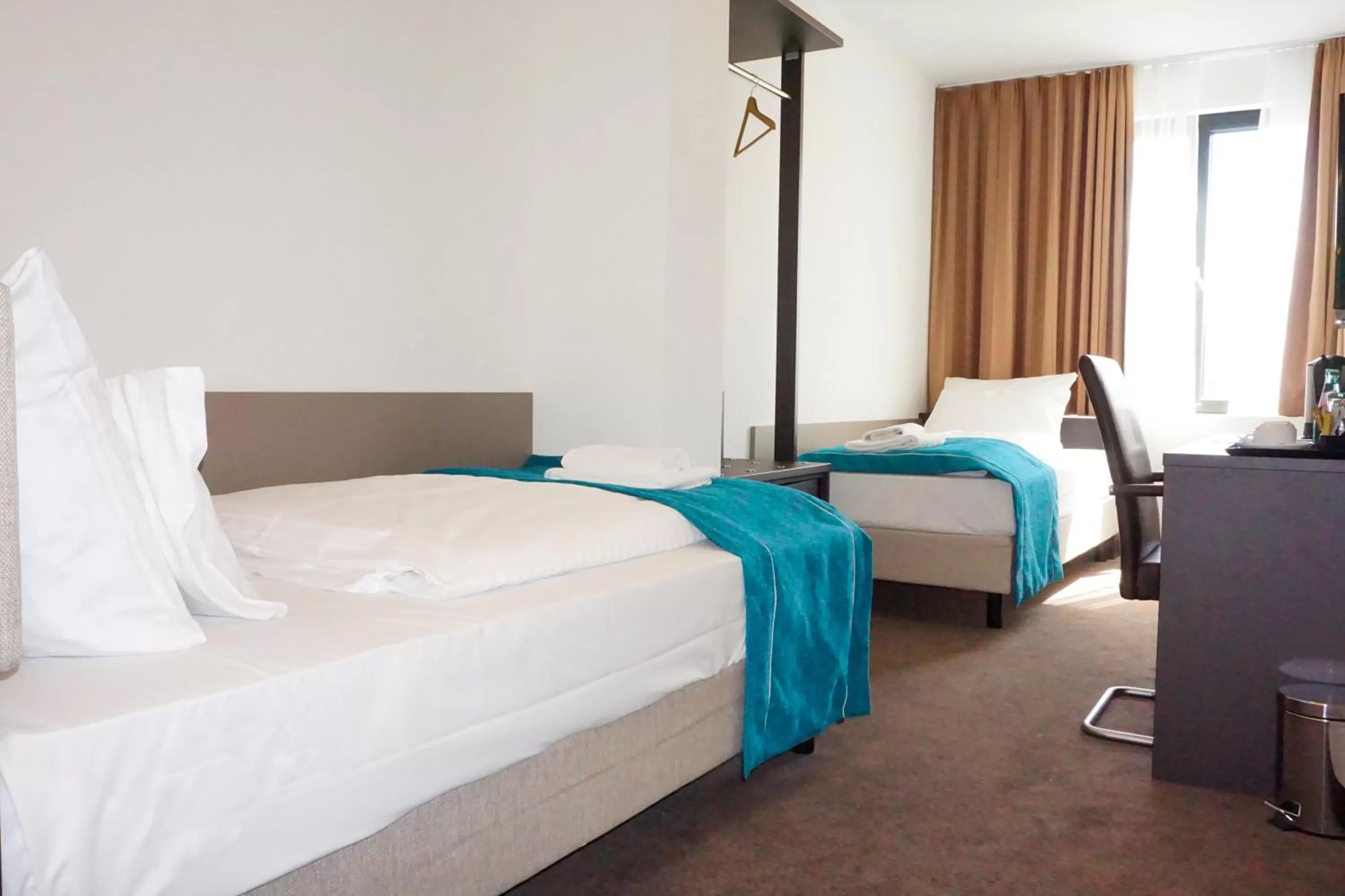 Bed in The Monument Hotel - BW Signature Collection