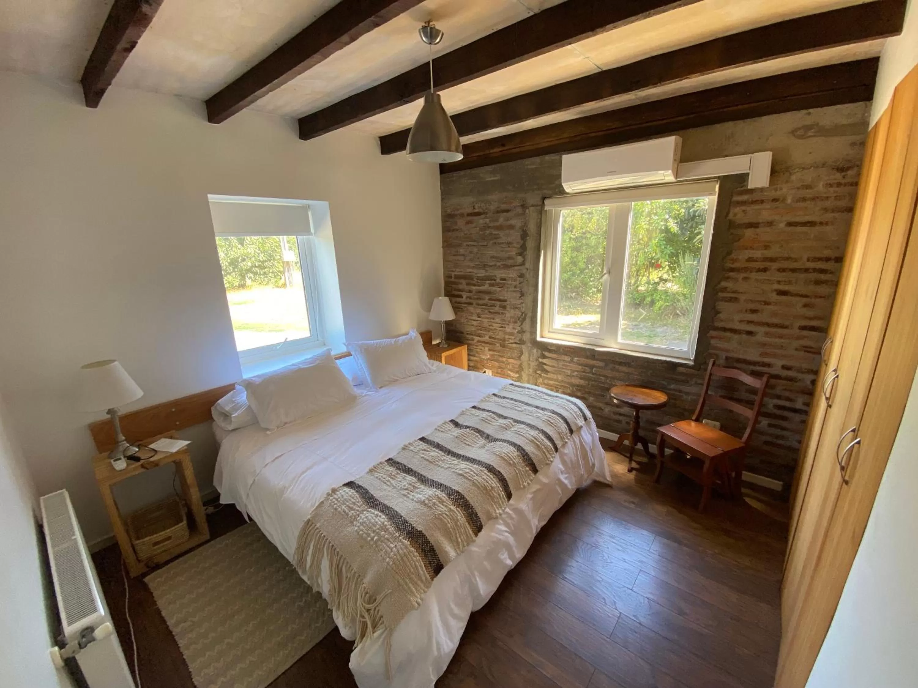 Bed in Family Orchard Bed & Breakfast