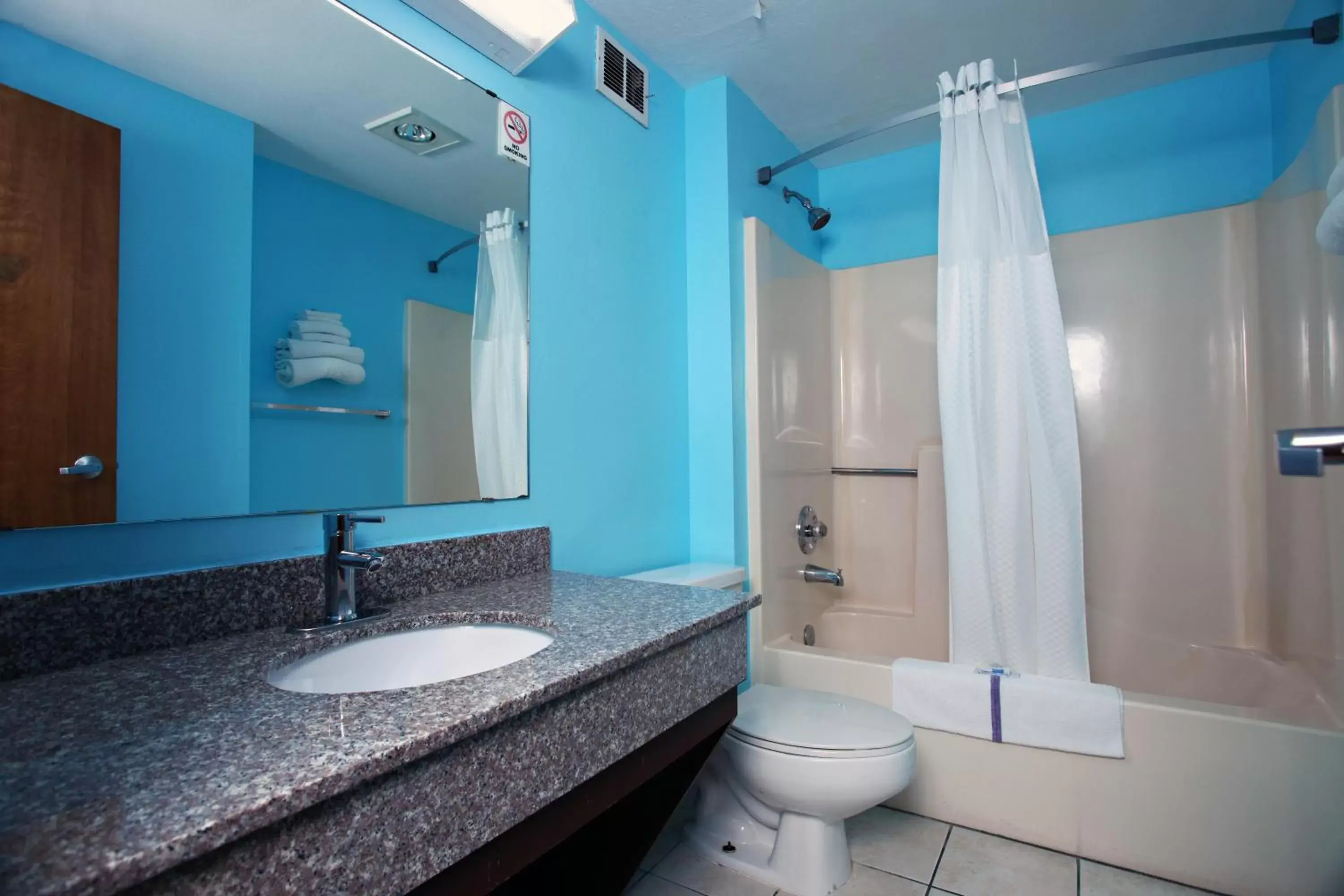 Bathroom in Coratel Inn & Suites by Jasper Newton