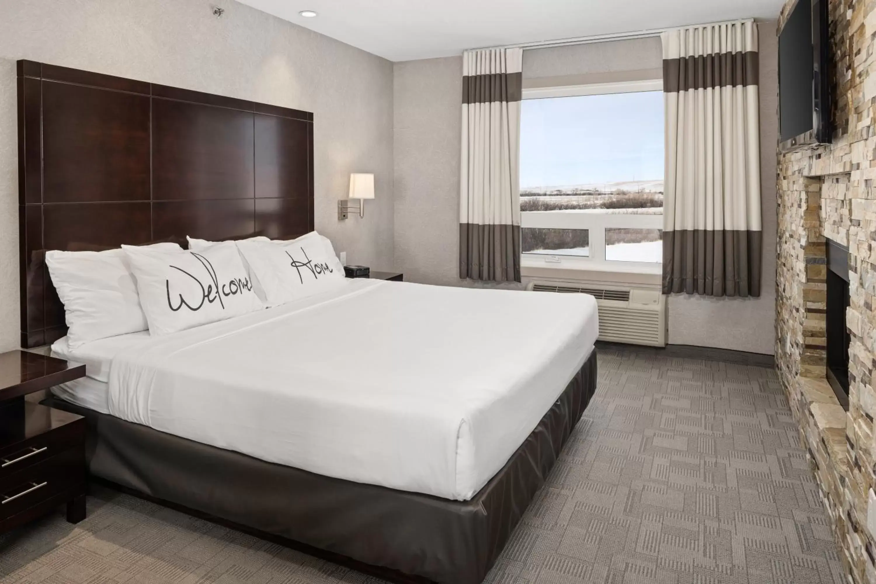 Bedroom, Bed in Home Inn & Suites - Swift Current