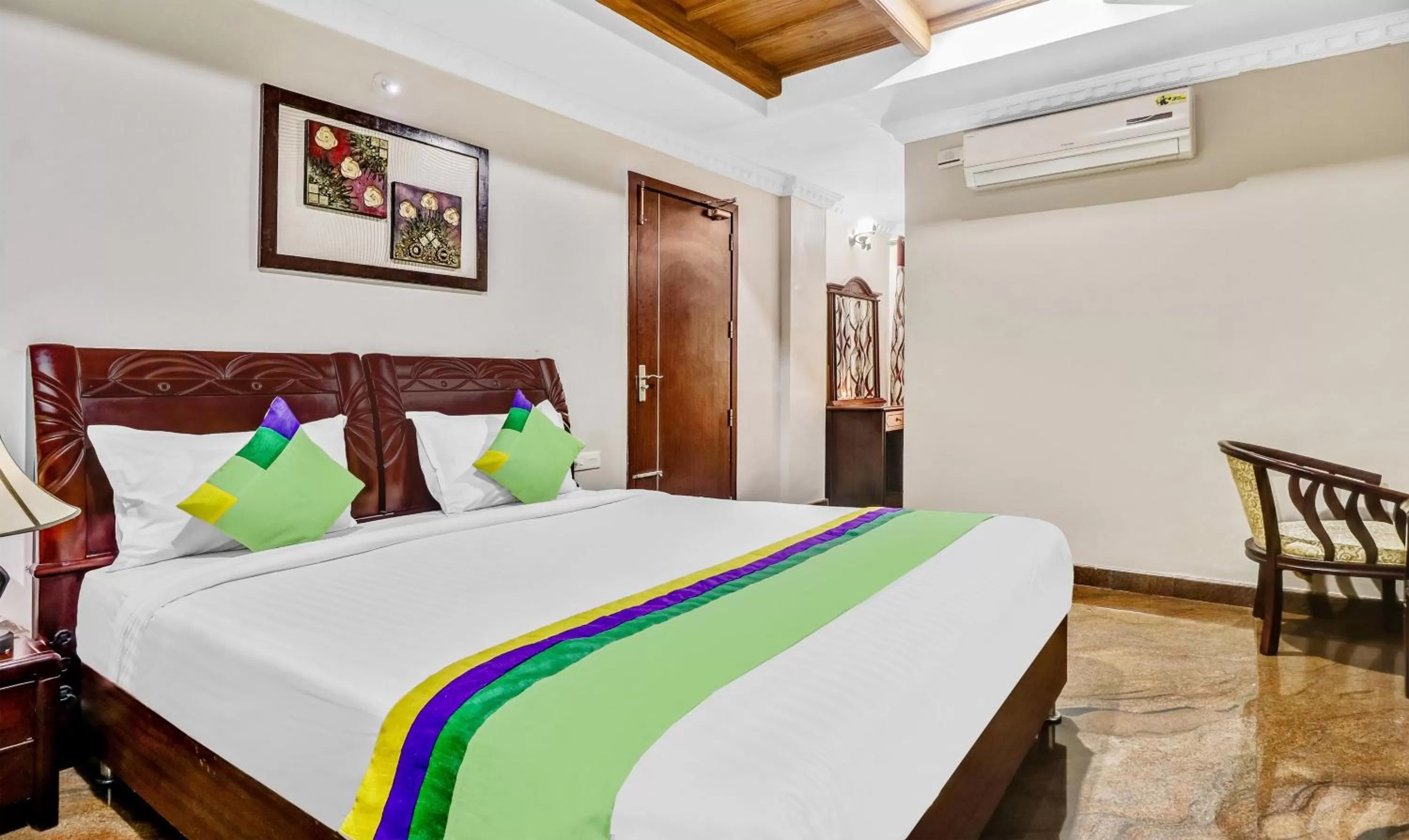 Photo of the whole room, Bed in Treebo Symphony Hotels And Resorts Angamally