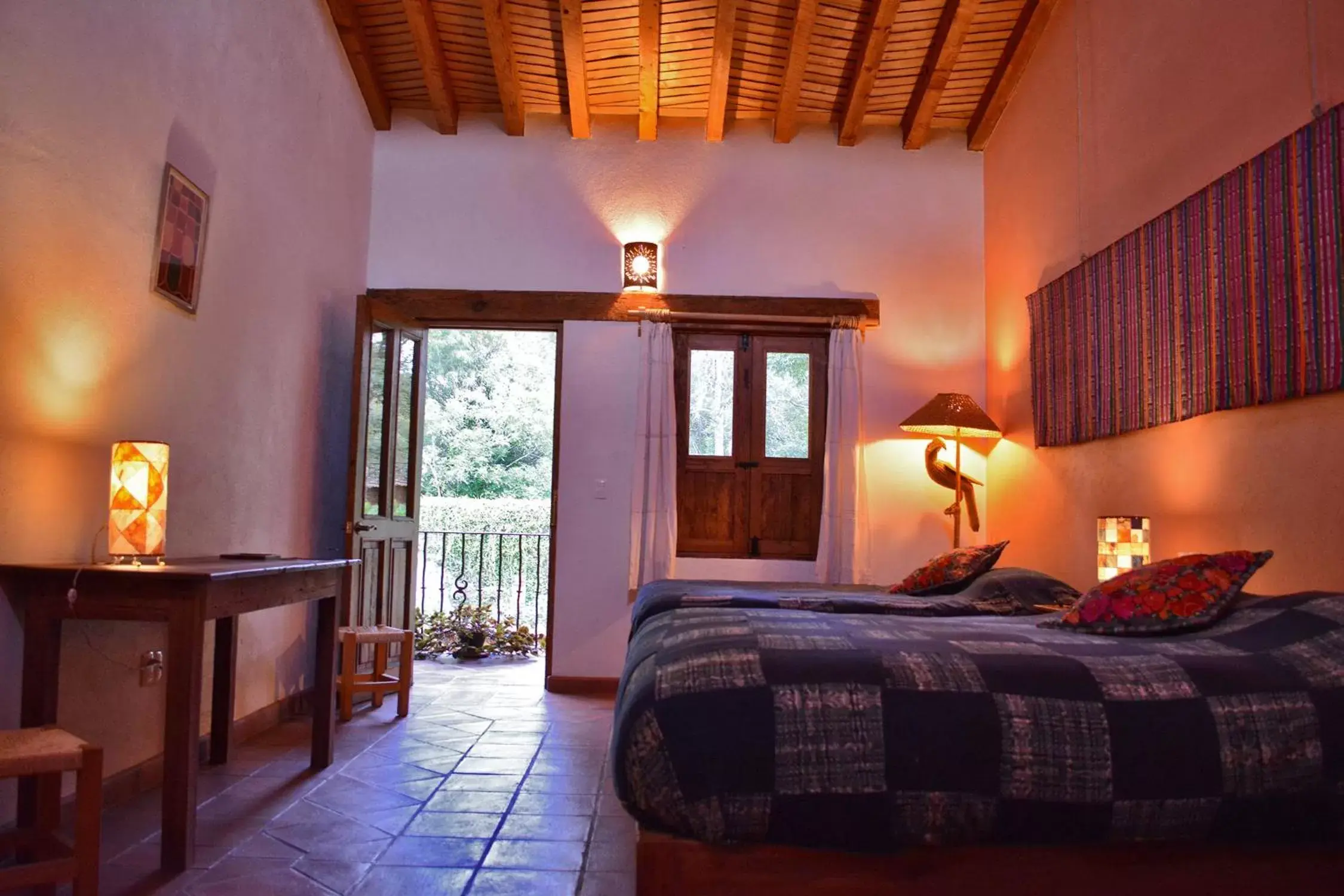 Photo of the whole room, Bed in Posada Yolihuani