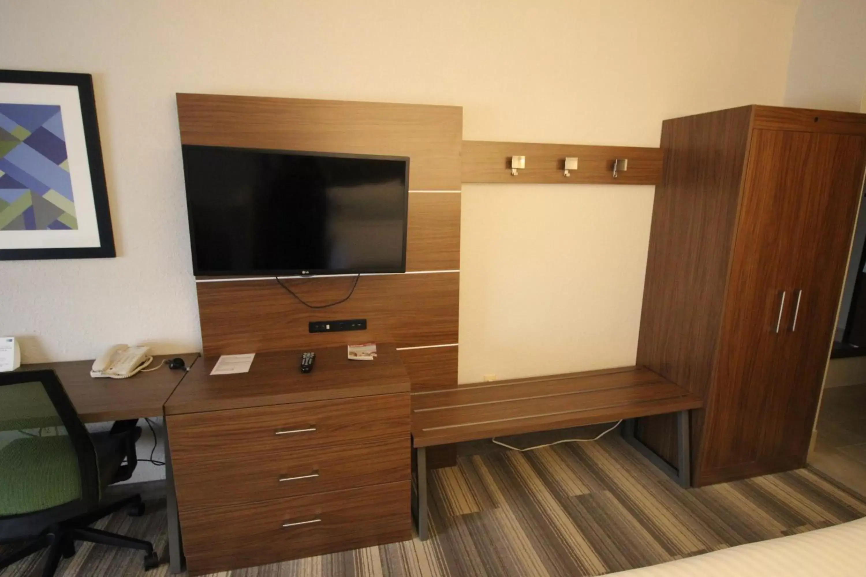 TV/Entertainment Center in Holiday Inn Express & Suites Houston - Memorial Park Area, an IHG Hotel