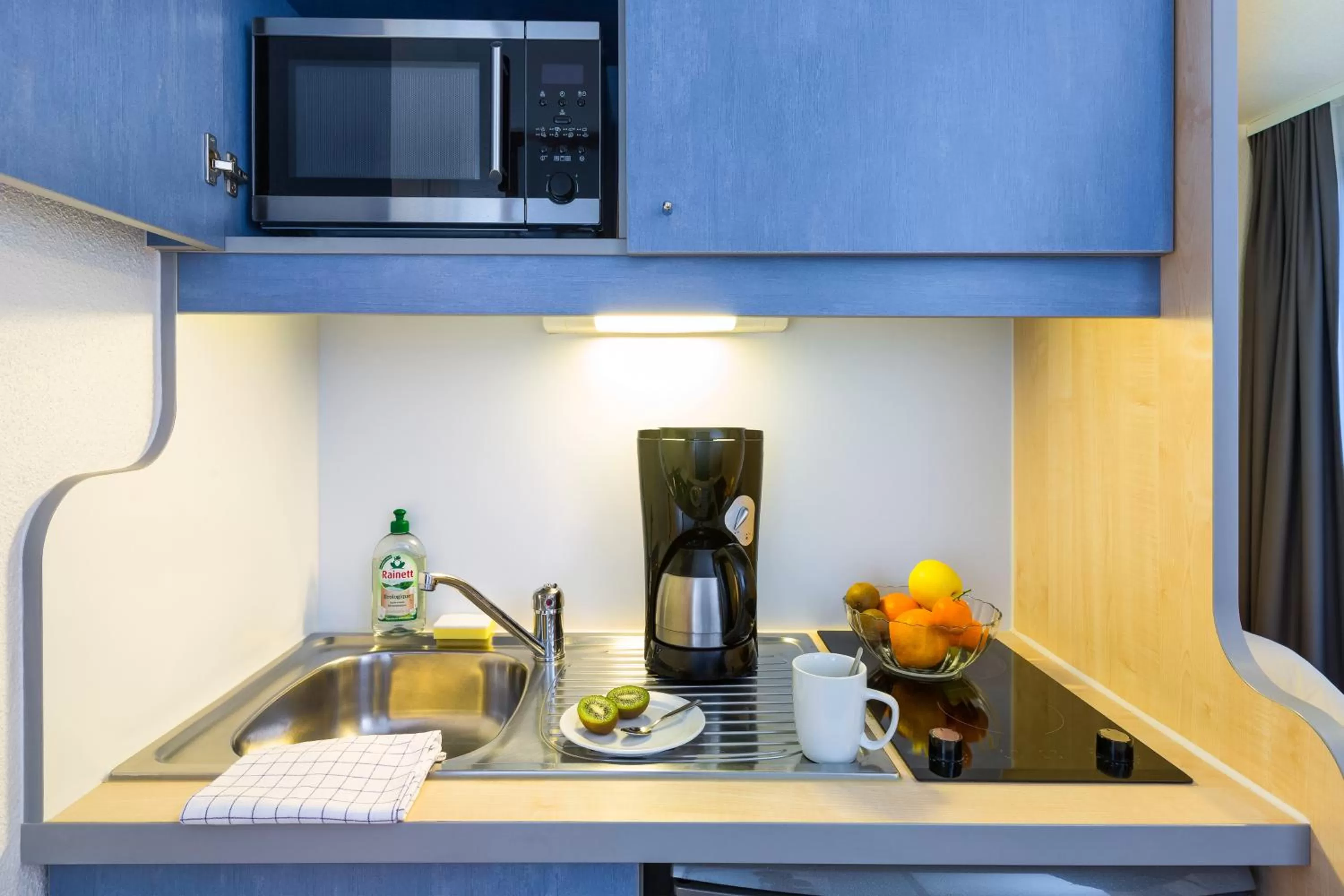 Kitchen or kitchenette in Aparthotel Adagio Access Rennes Centre