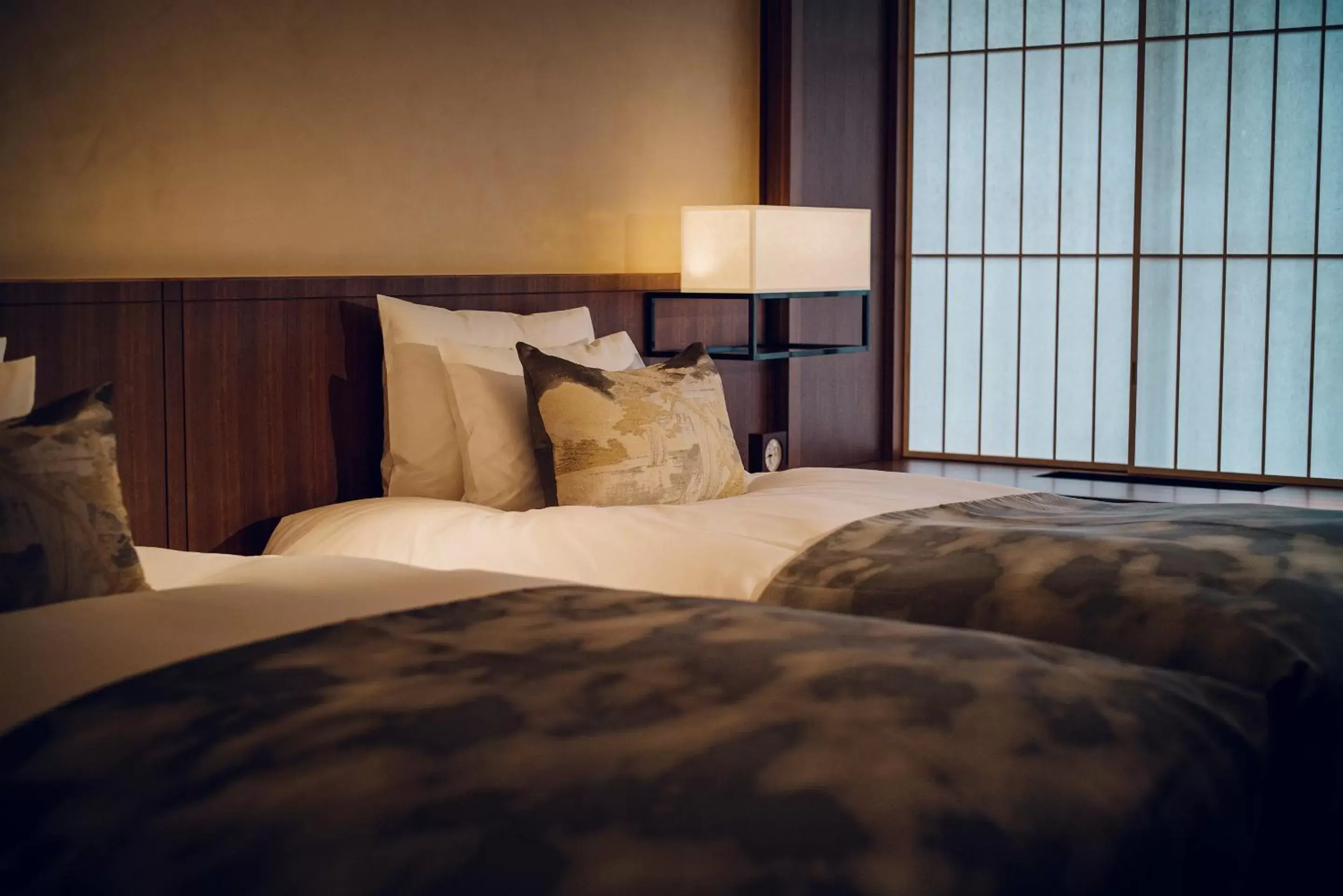 Bed in THE HIRAMATSU KYOTO