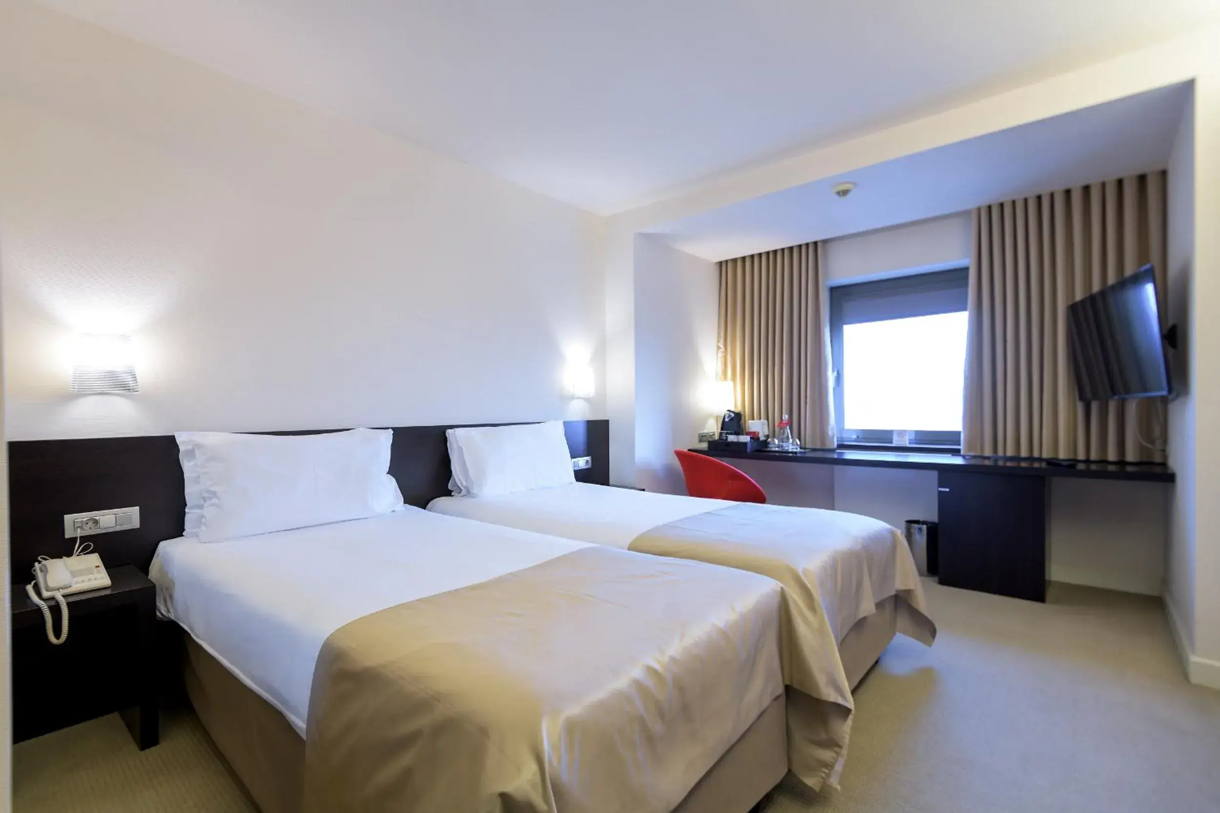 Bed in Ramada Plaza by Wyndham Bucharest Convention Center