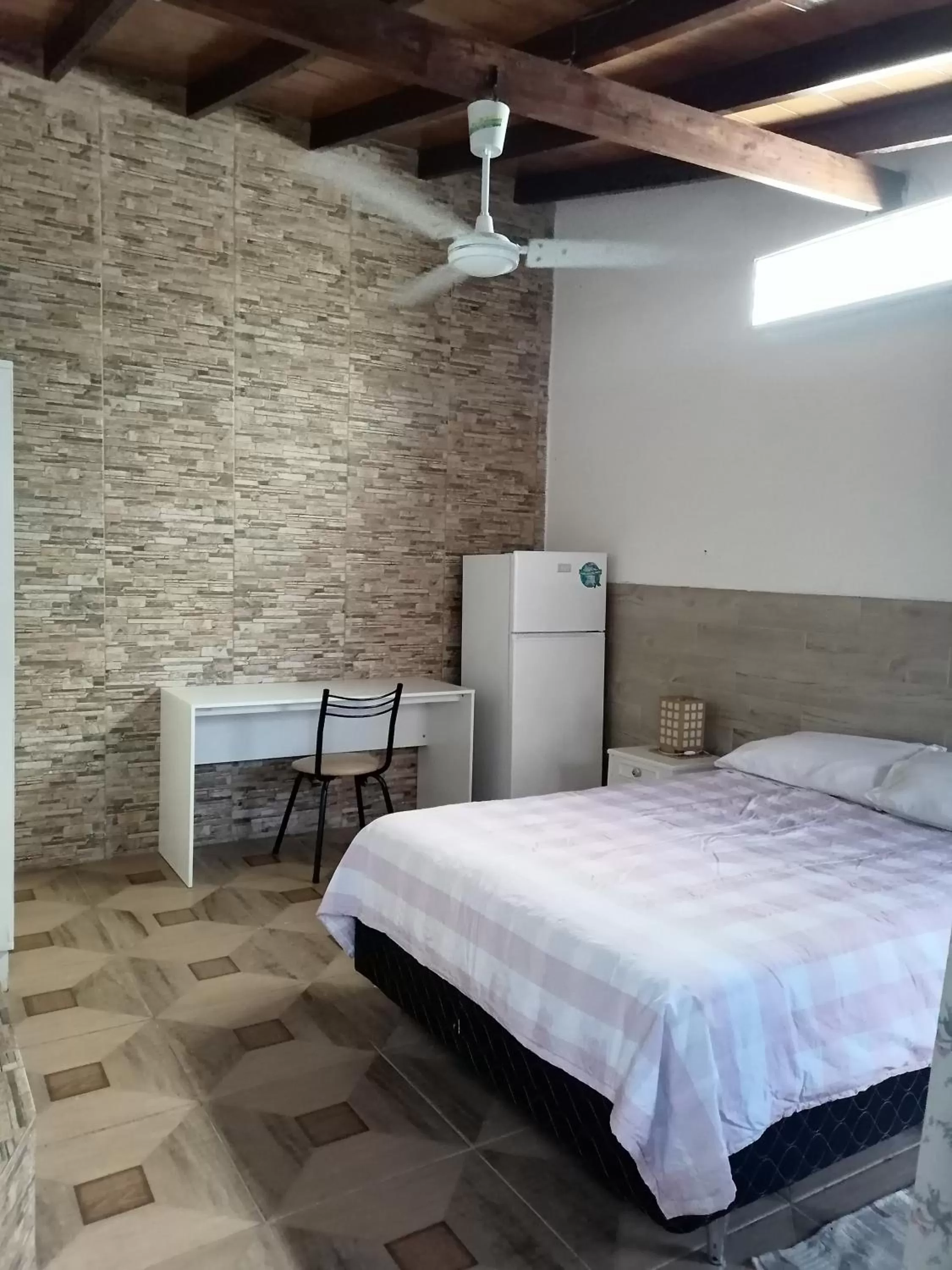 Seating area, Bed in Granados