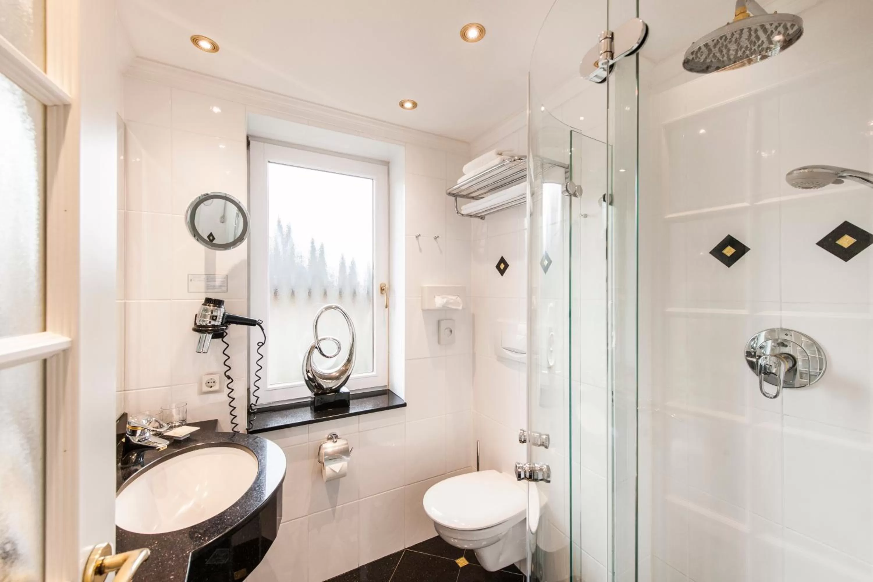 Bathroom in Büngers Apartment-Hotel mit Gartensauna - modern, gemütlich und strandnah