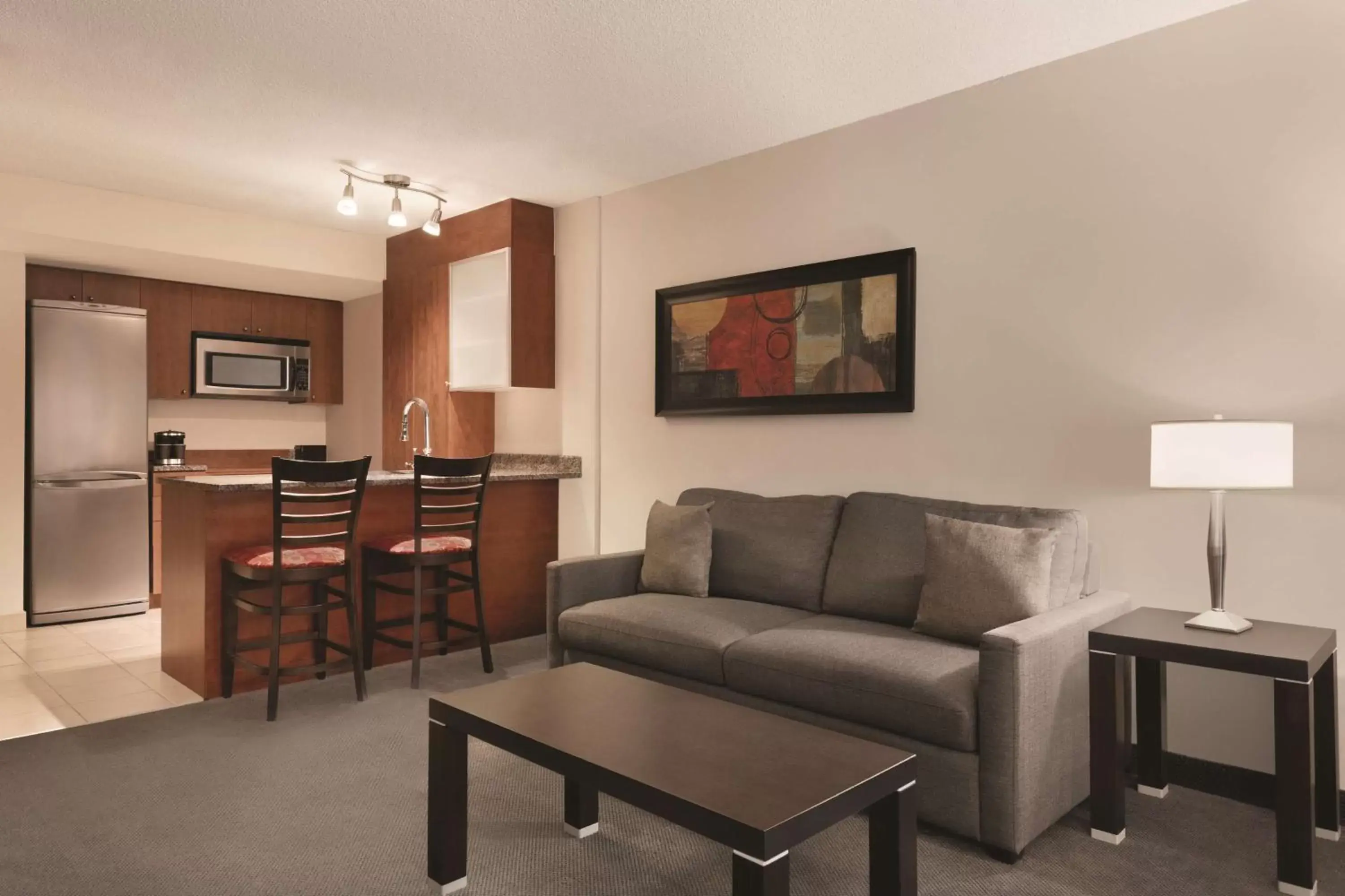 Bedroom, Seating Area in Embassy Suites by Hilton - Montreal