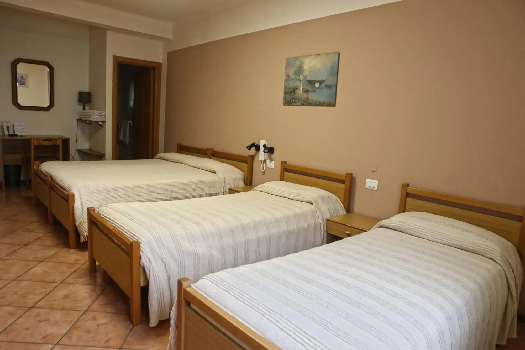 Photo of the whole room, Bed in Albergo Gusmeroli