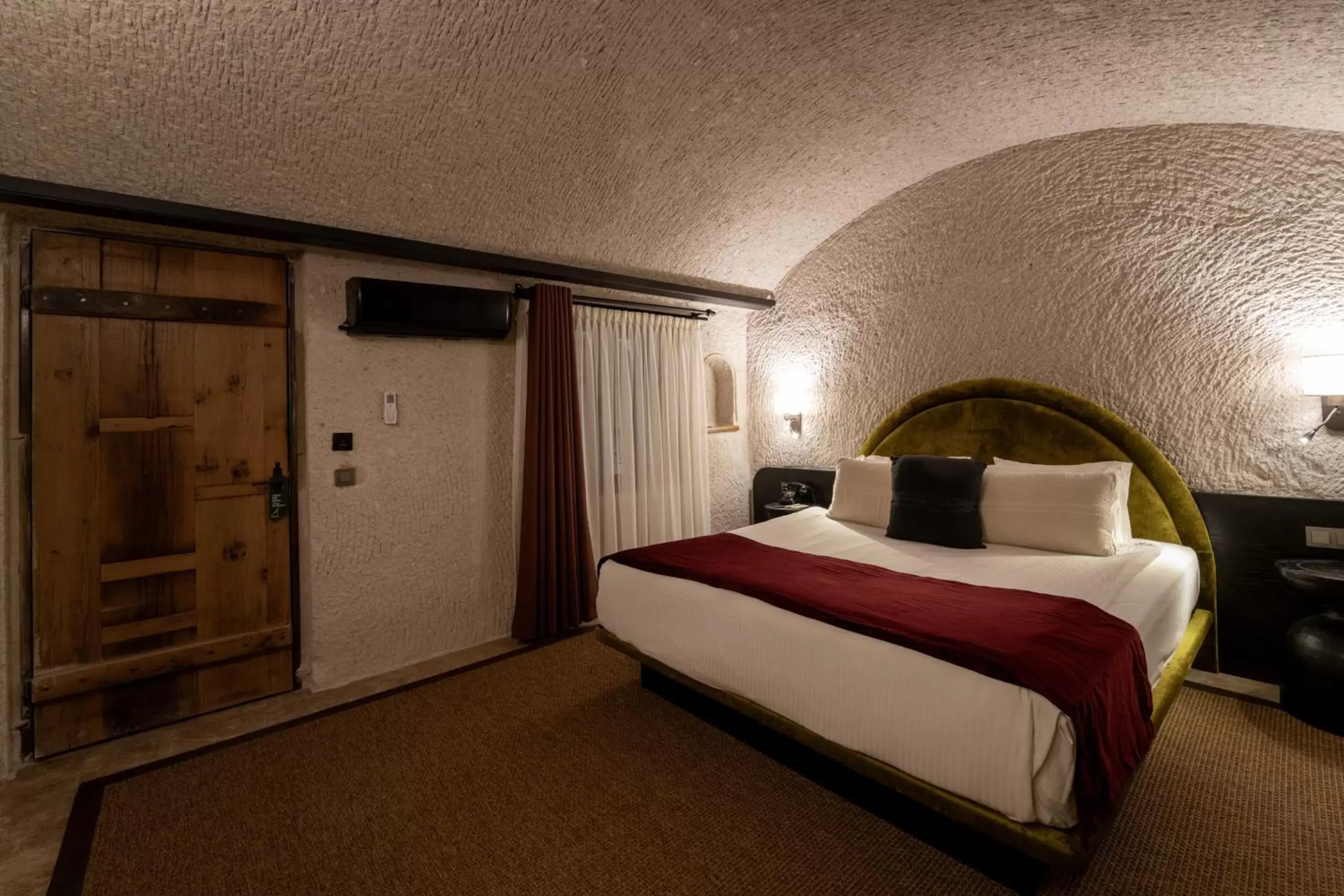 Bedroom, Bed in Artemis Cave Suites & Spa- Adults Only