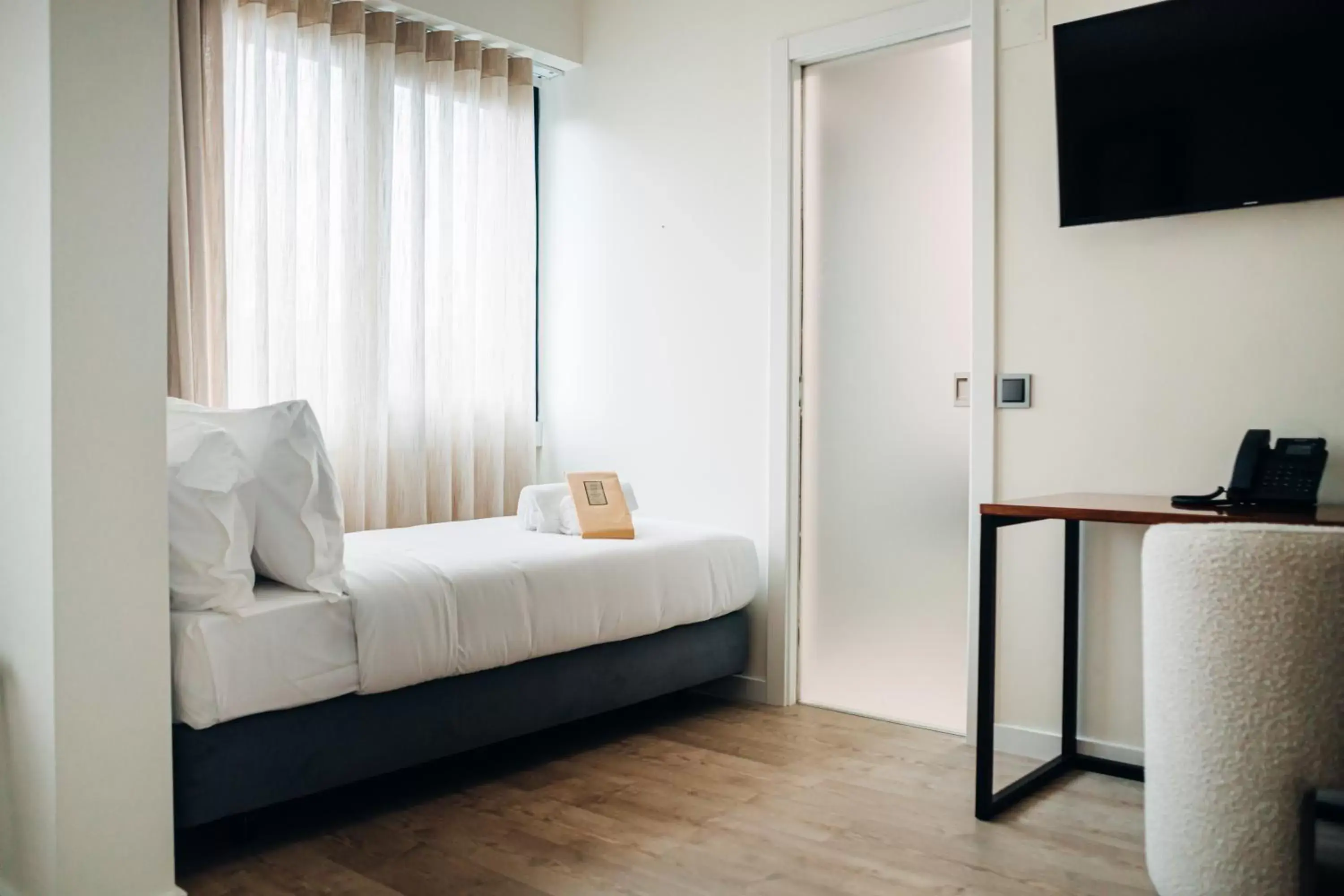 Bedroom, Seating Area in Next Level Premium Hotels