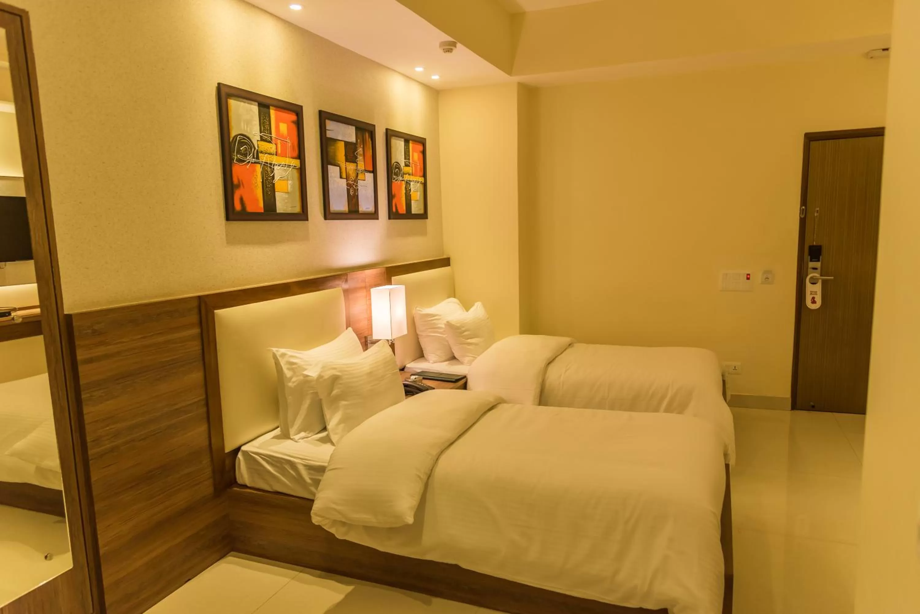 Bed in Sangai Continental (The Boutique Hotel)