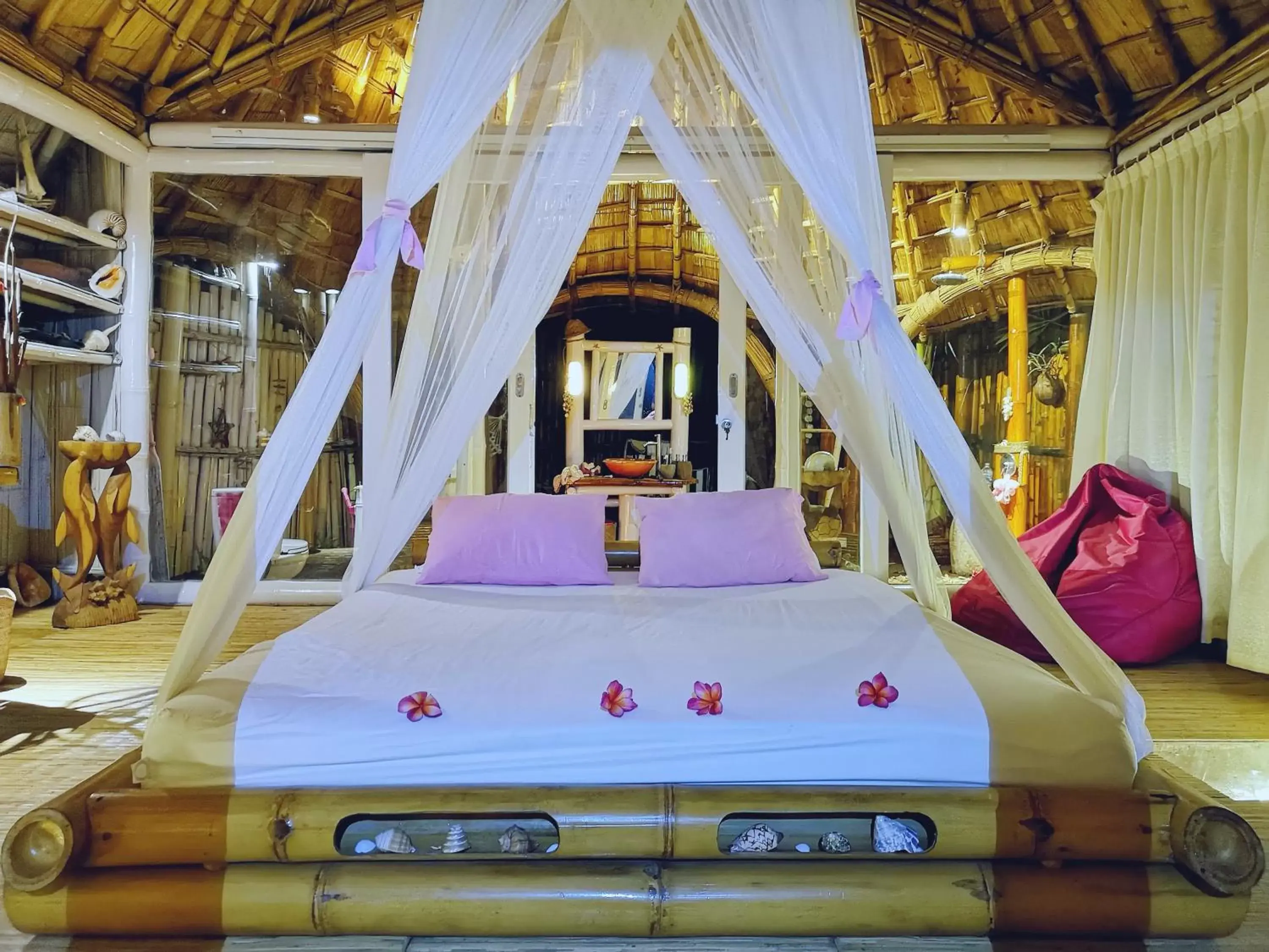 Bed in Coconut Garden Beach Resort