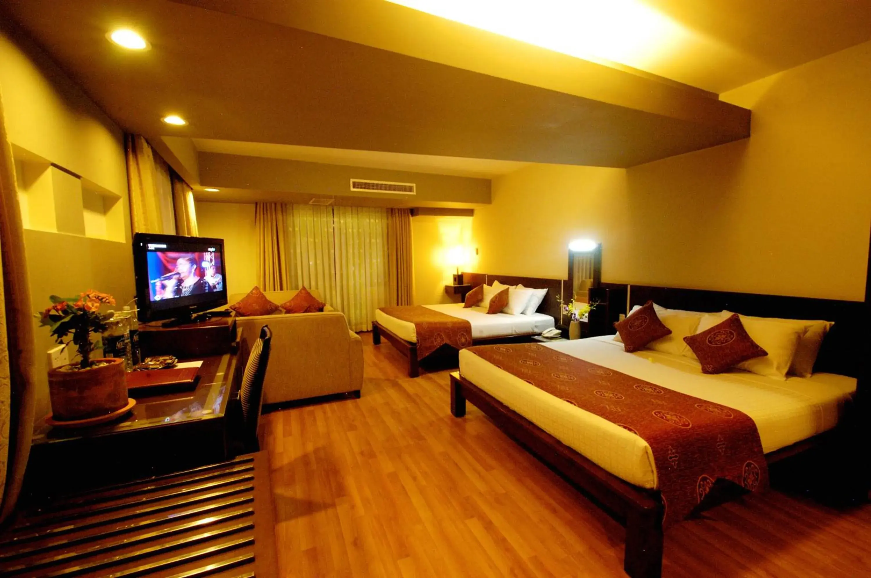 Photo of the whole room, TV/Entertainment Center in Asia Paradise Hotel