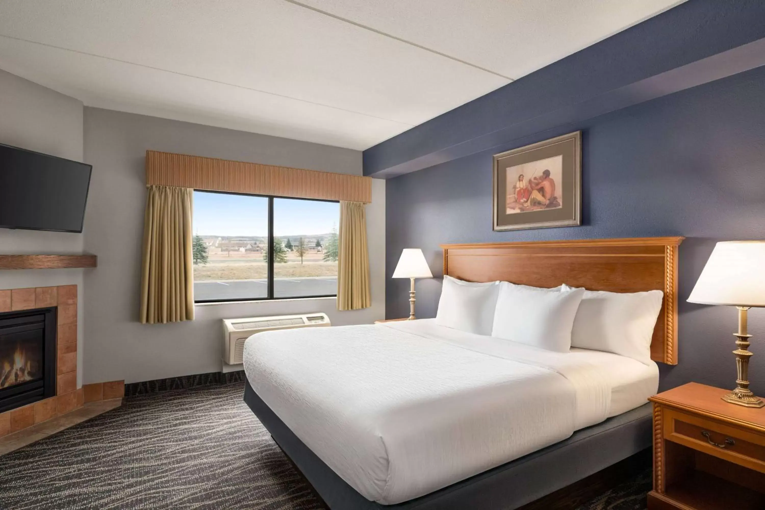 Photo of the whole room, Bed in AmericInn by Wyndham Laramie Near University of Wyoming