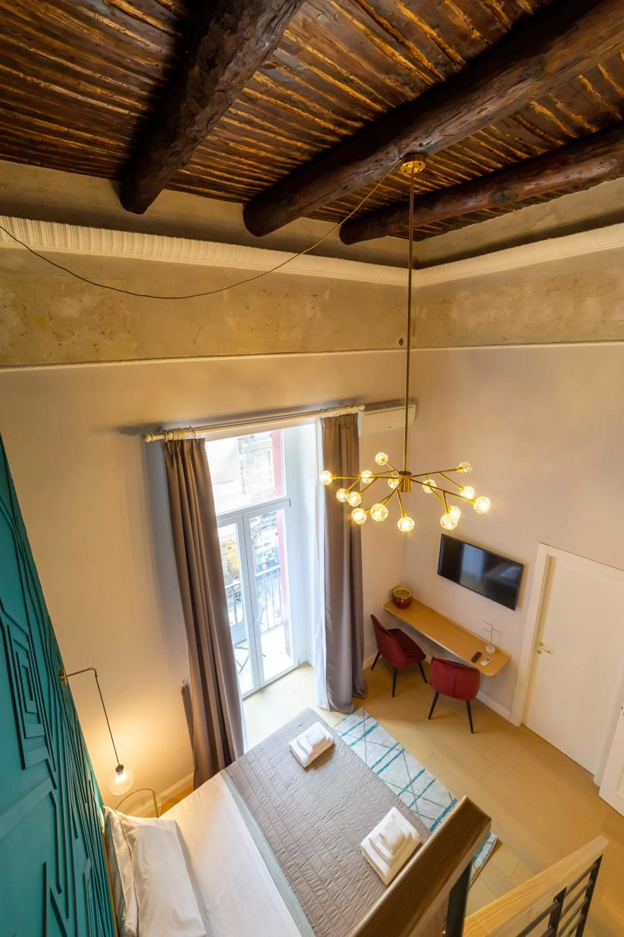 Photo of the whole room, Bed in The Duomo House by House In Naples