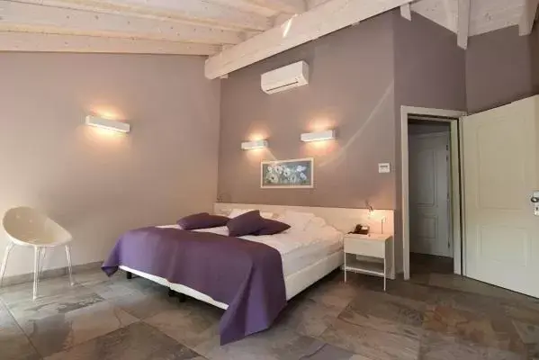 Bed in Relais Villa Porta