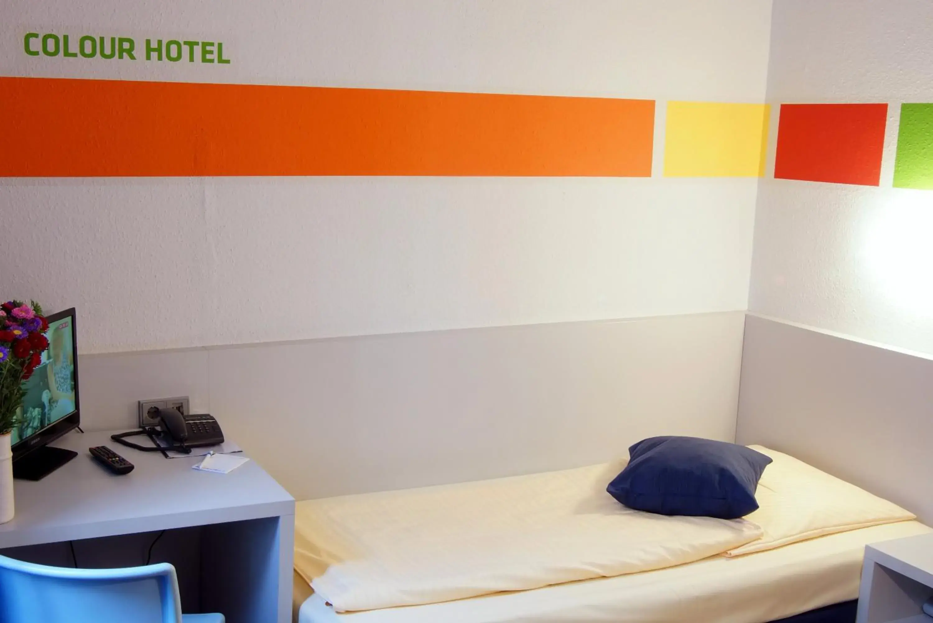 Photo of the whole room, Bed in Colour Hotel